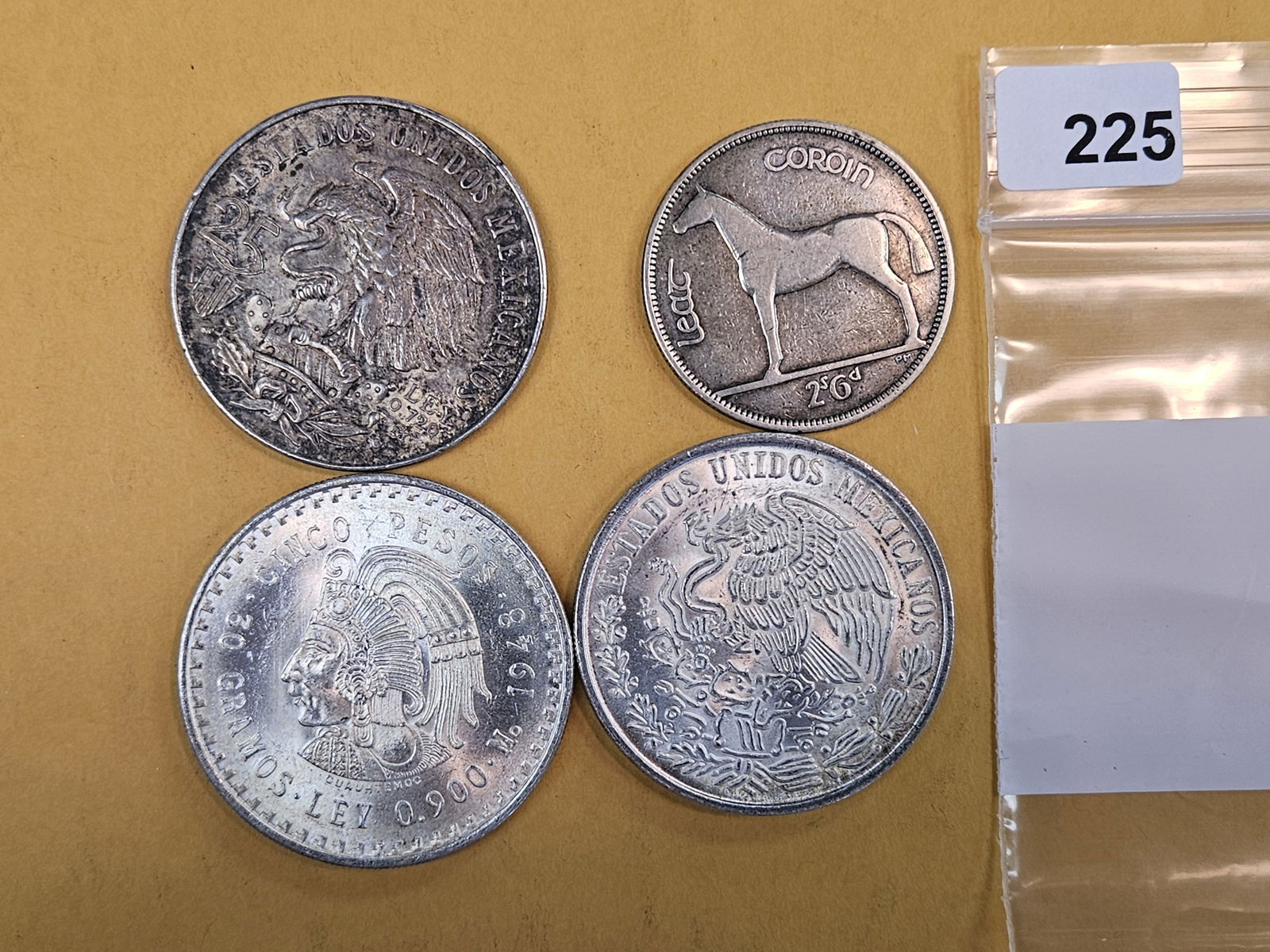 Four more larger silver World coins: Ireland and Mexico 