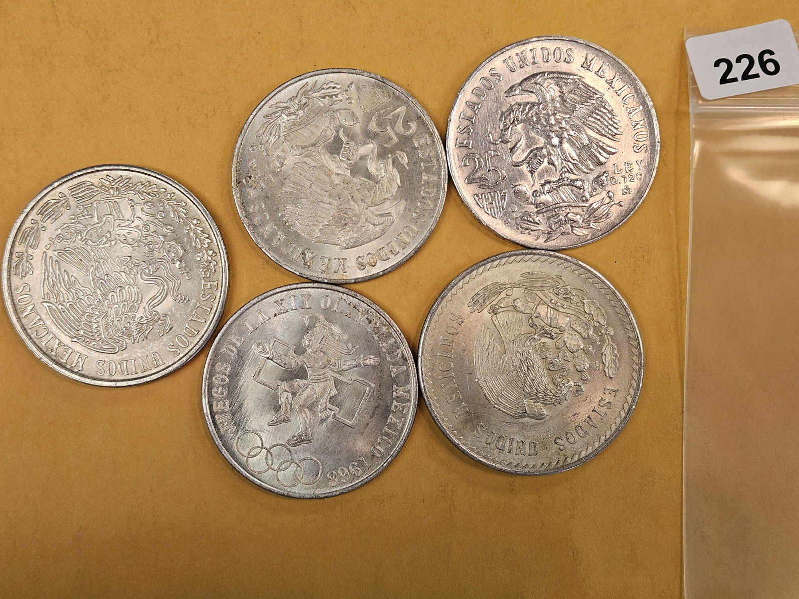 Five larger Mexican silver coins: Circulated 