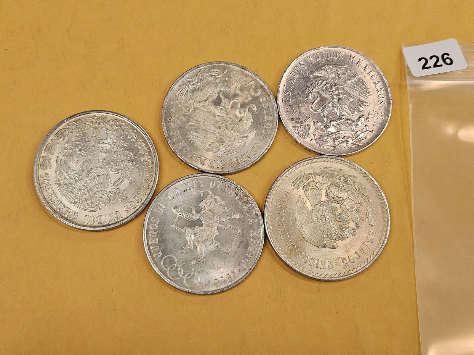 Five larger Mexican silver coins - 2