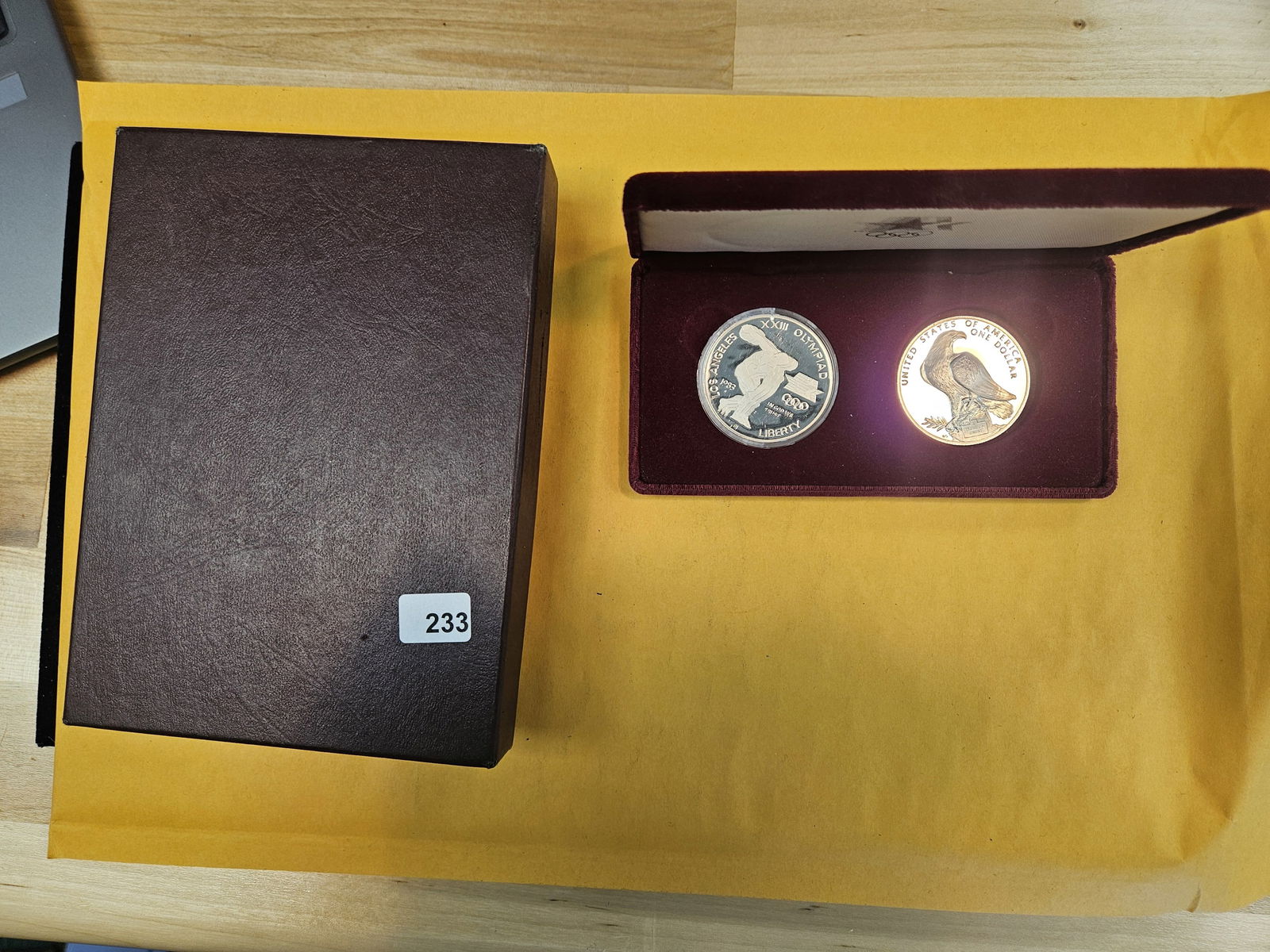 Two US Mint Sets with Three Silver Dollars