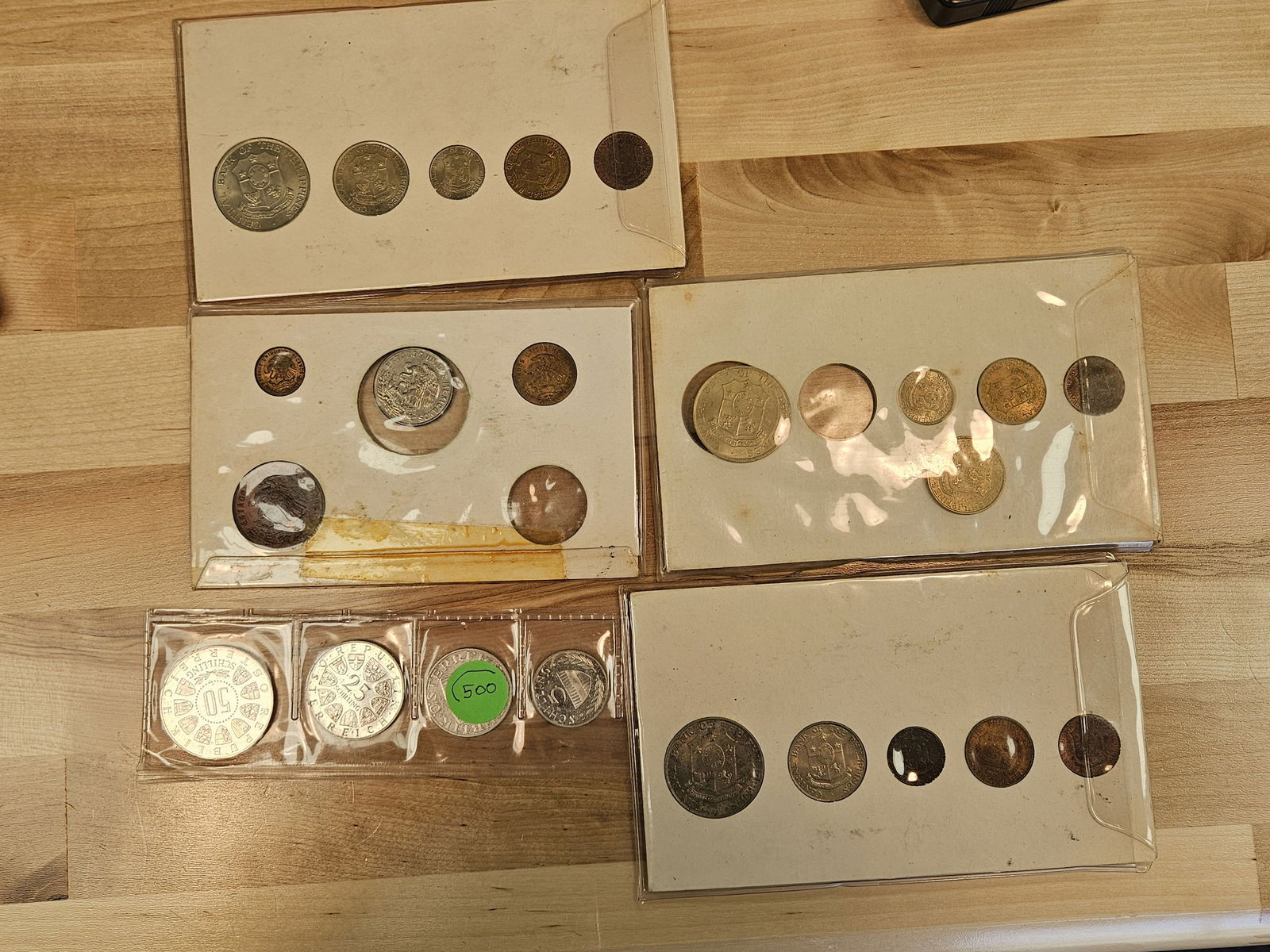 Five mixed World coin sets - 5