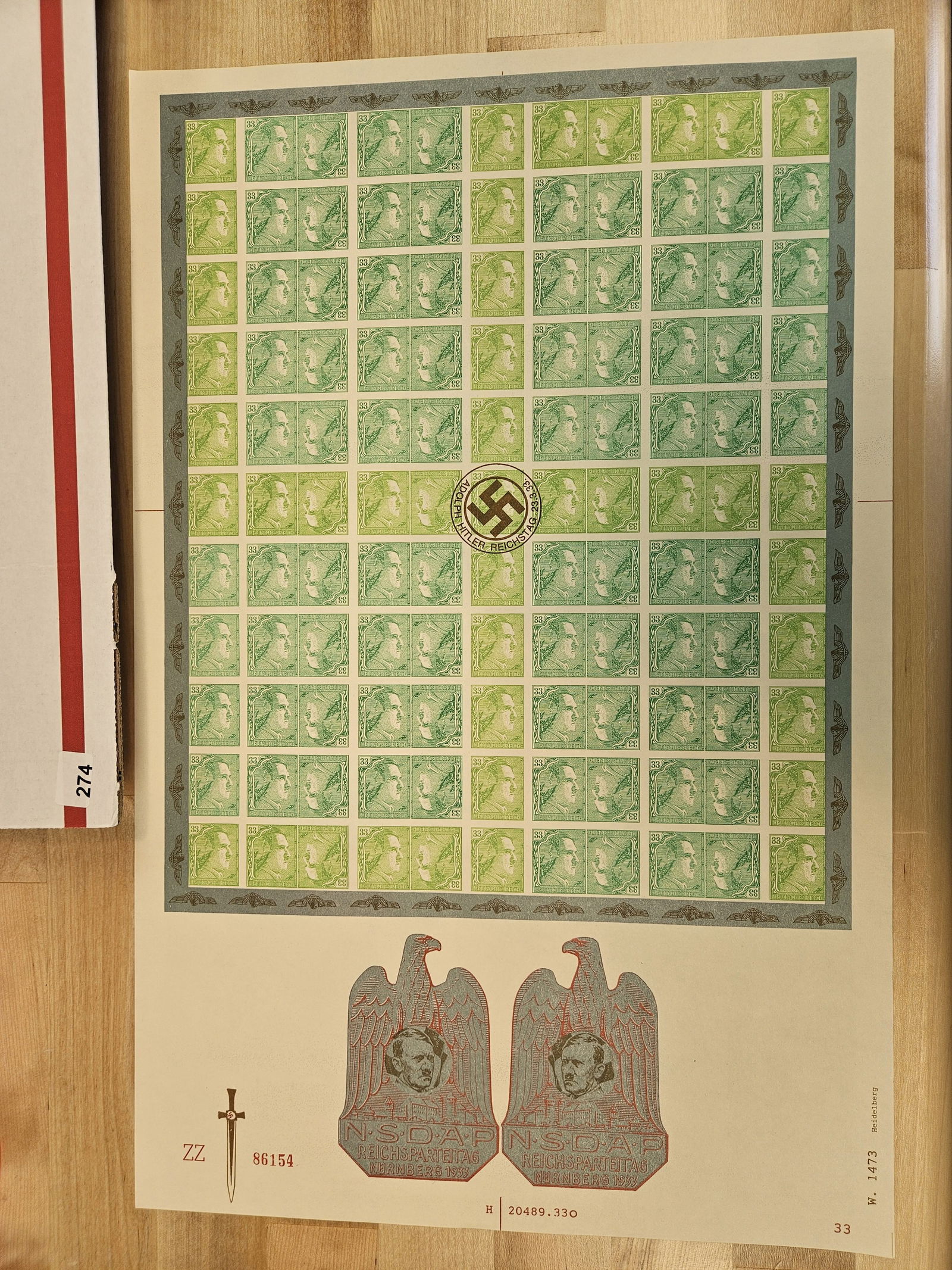 RARE PHILATELIC!: Rare German group of 121 stamps. Complete on an uncut Stamp Sheet. 33c stamps with Hitlers image and a swastika in the center. Only other one I could find was sold in a Matthew Bullock auction in 2022