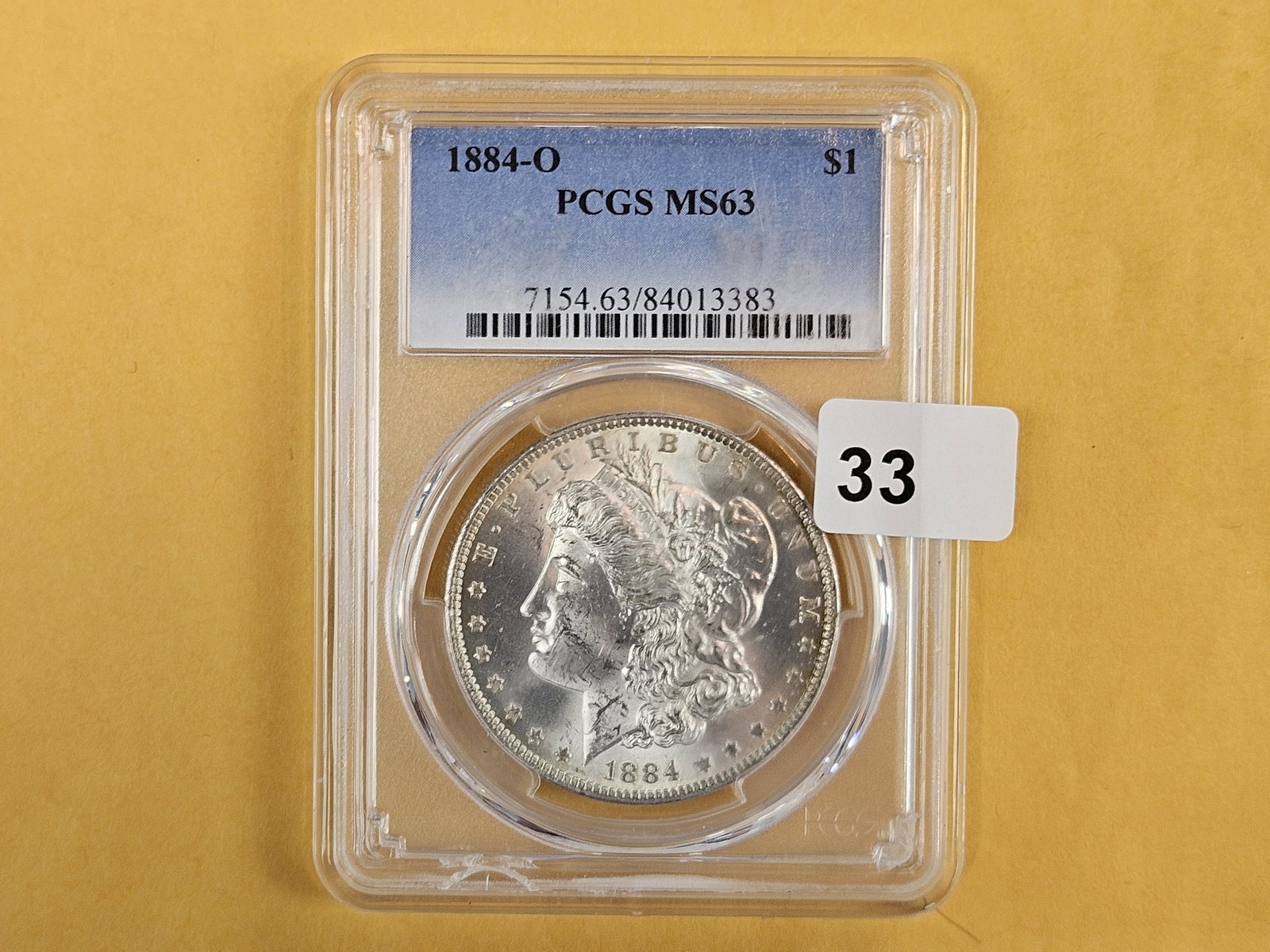 PCGS 1884-O Morgan Dollar in Mint State 63 - 2