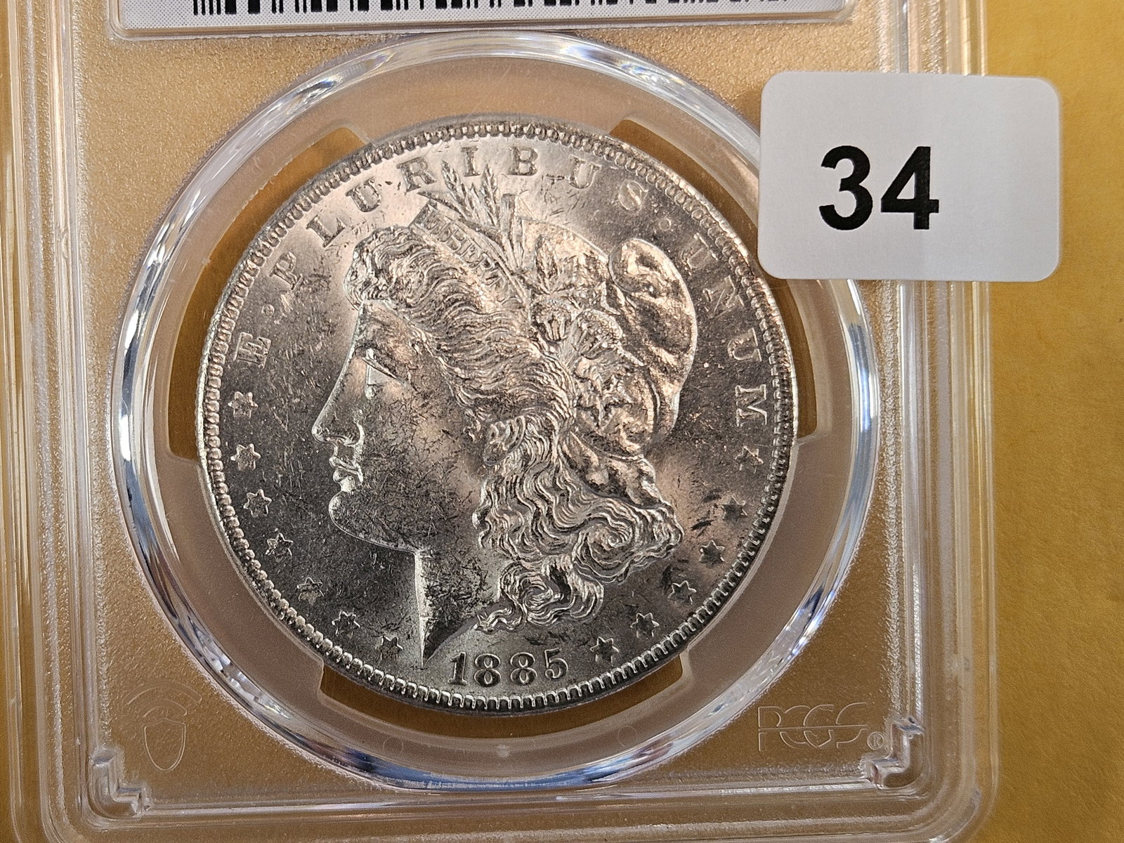 PCGS 1885-O Morgan Dollar in Mint State 61: White 
