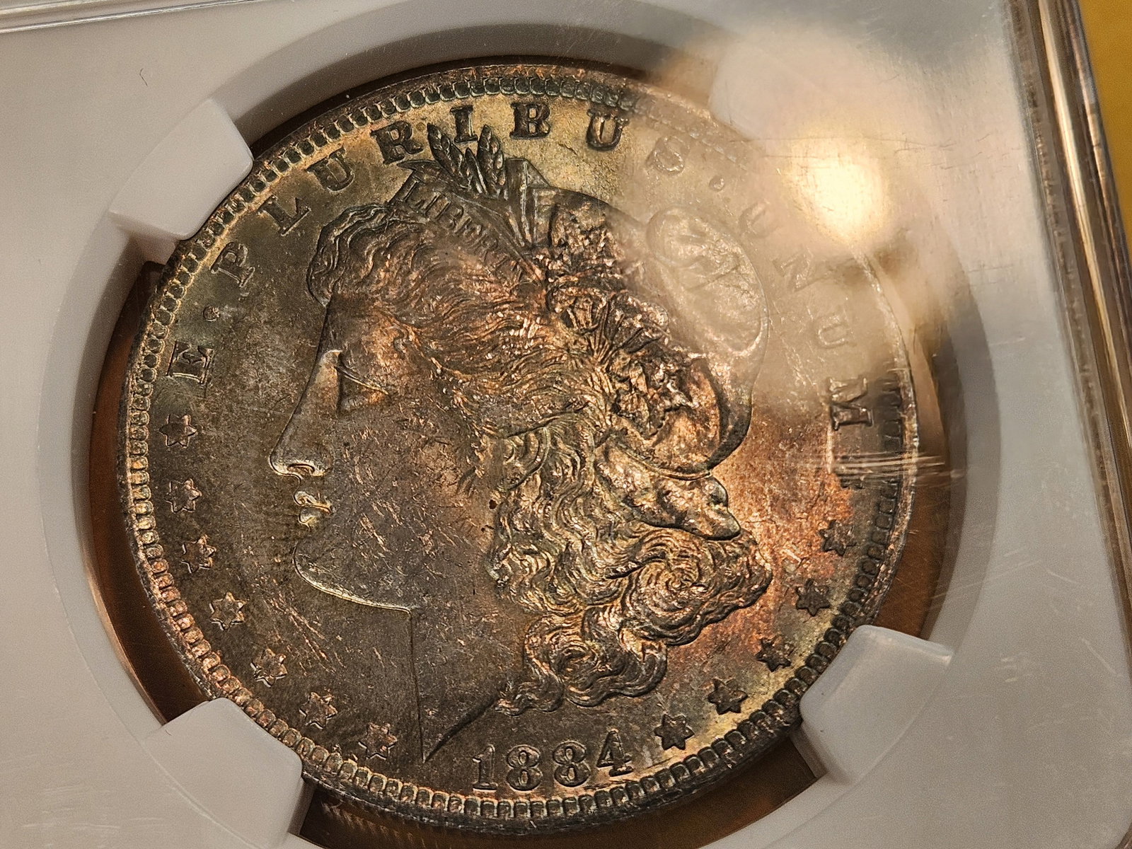 NGC 1884-O Morgan Dollar in Mint State 62 - 5