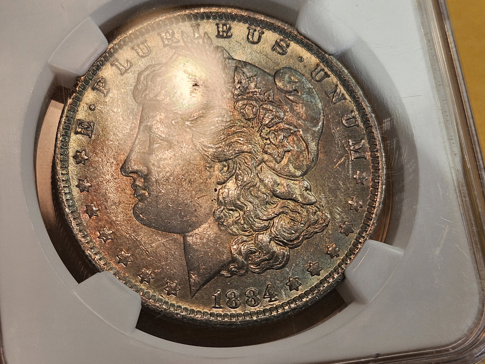 NGC 1884-O Morgan Dollar in Mint State 62 - 6