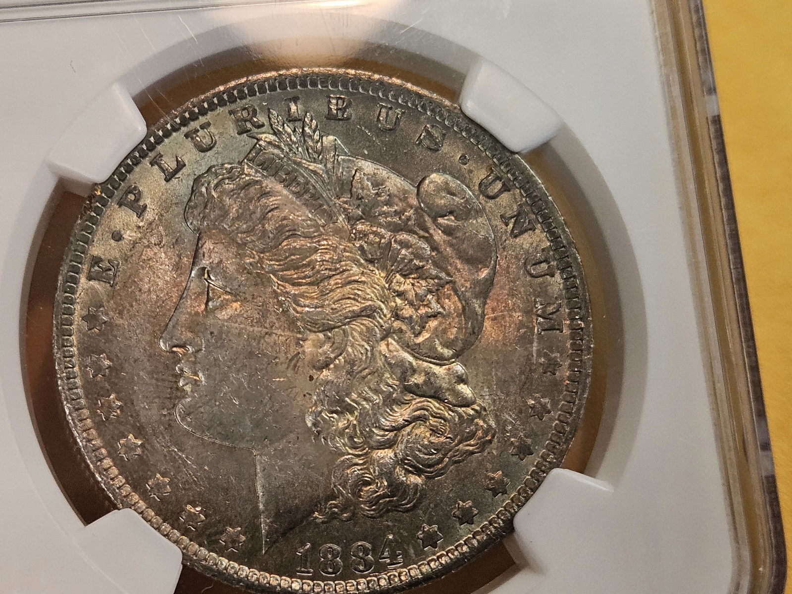 NGC 1884-O Morgan Dollar in Mint State 62 - 7