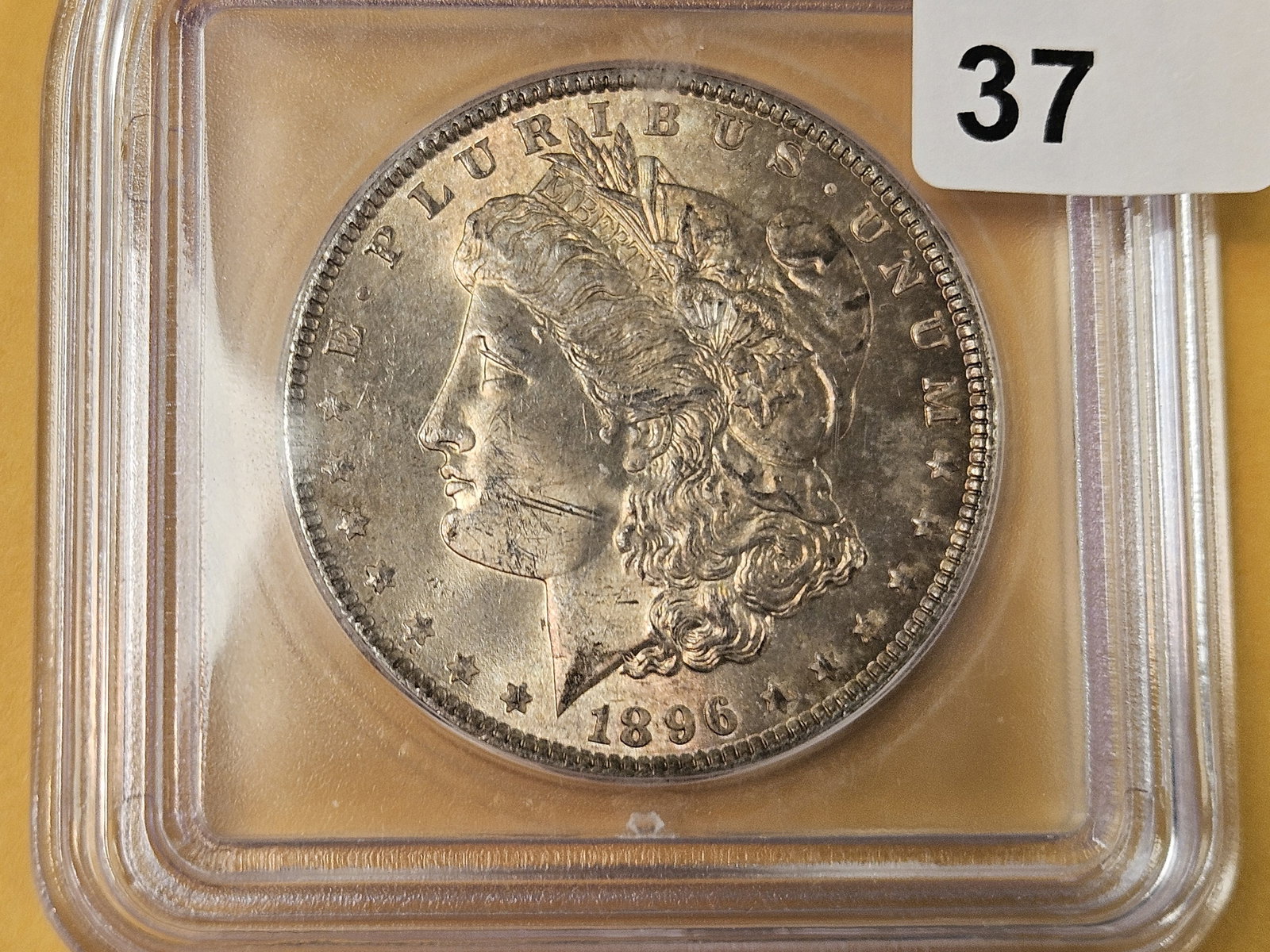 ICG 1896 Morgan Silver Dollar in Mint State 64: Good toning 