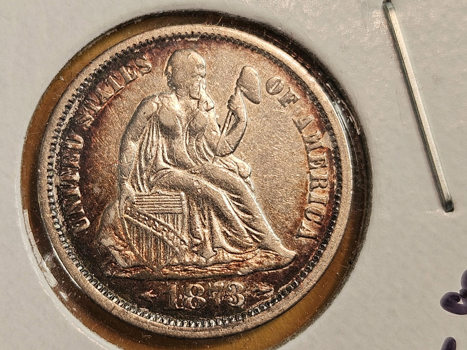 1873 With Arrows Seated Liberty silver dime in Extra Fine plus: Great toning! The 3 is repunched