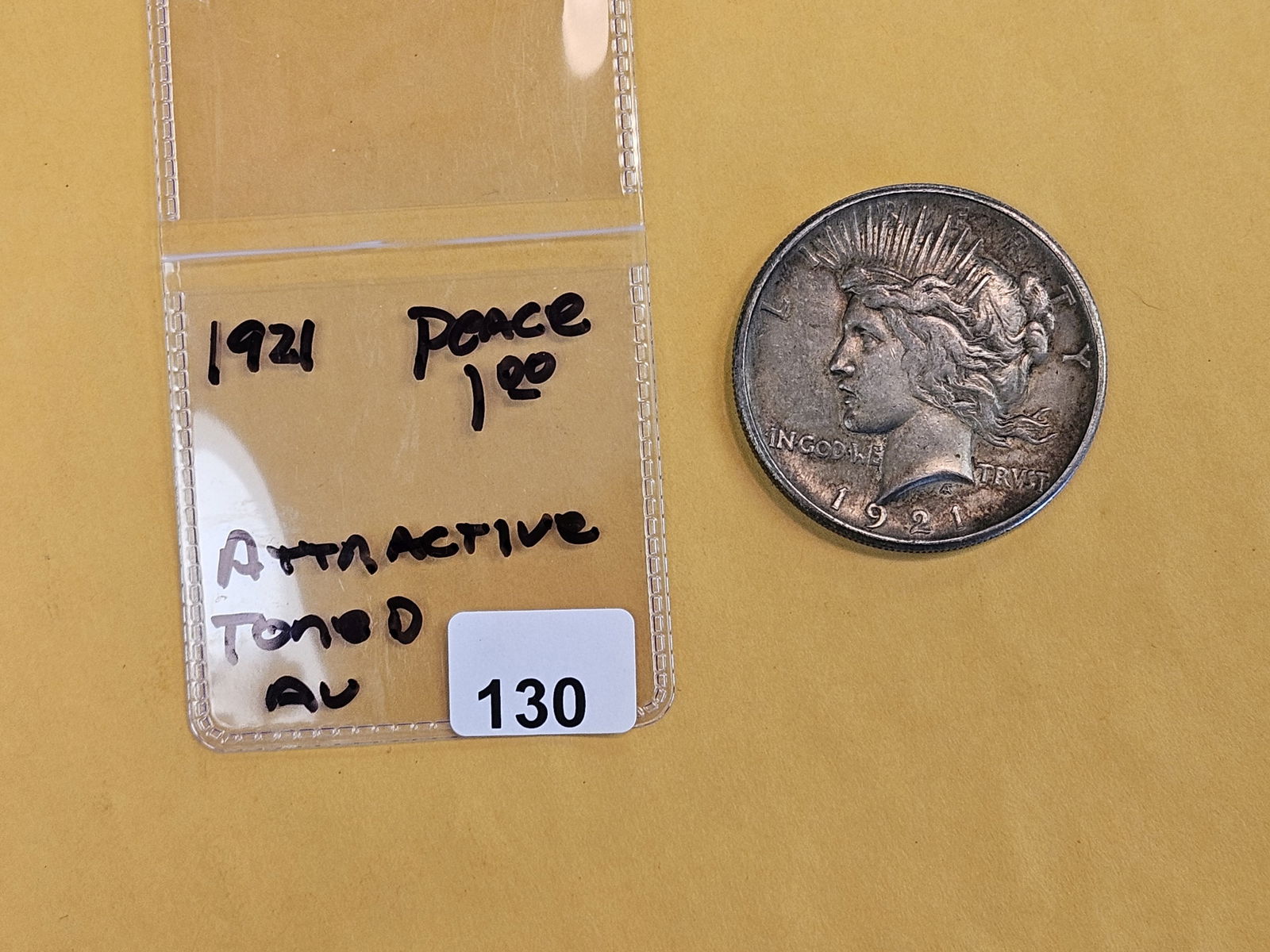 ** KEY DATE ** 1921 Peace silver Dollar in About Uncirculated - 2