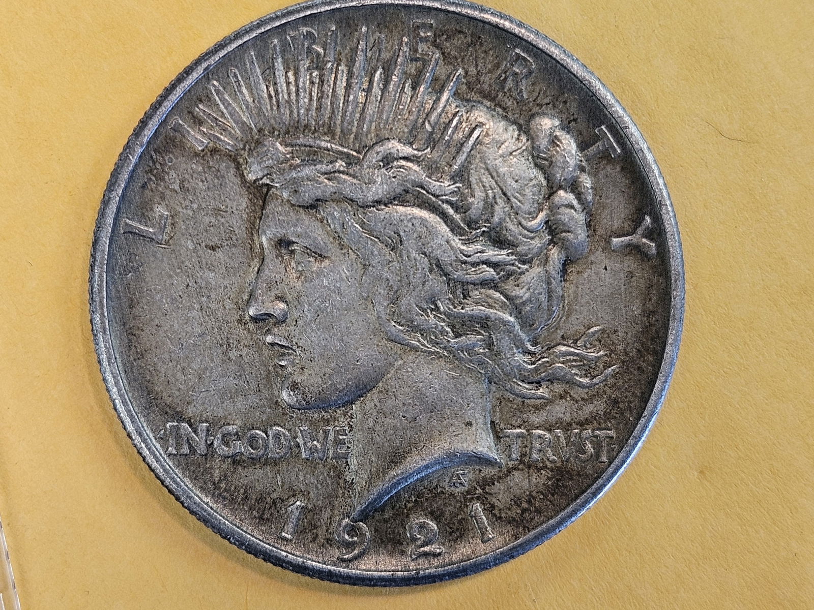 ** KEY DATE ** 1921 Peace silver Dollar in About Uncirculated - 4