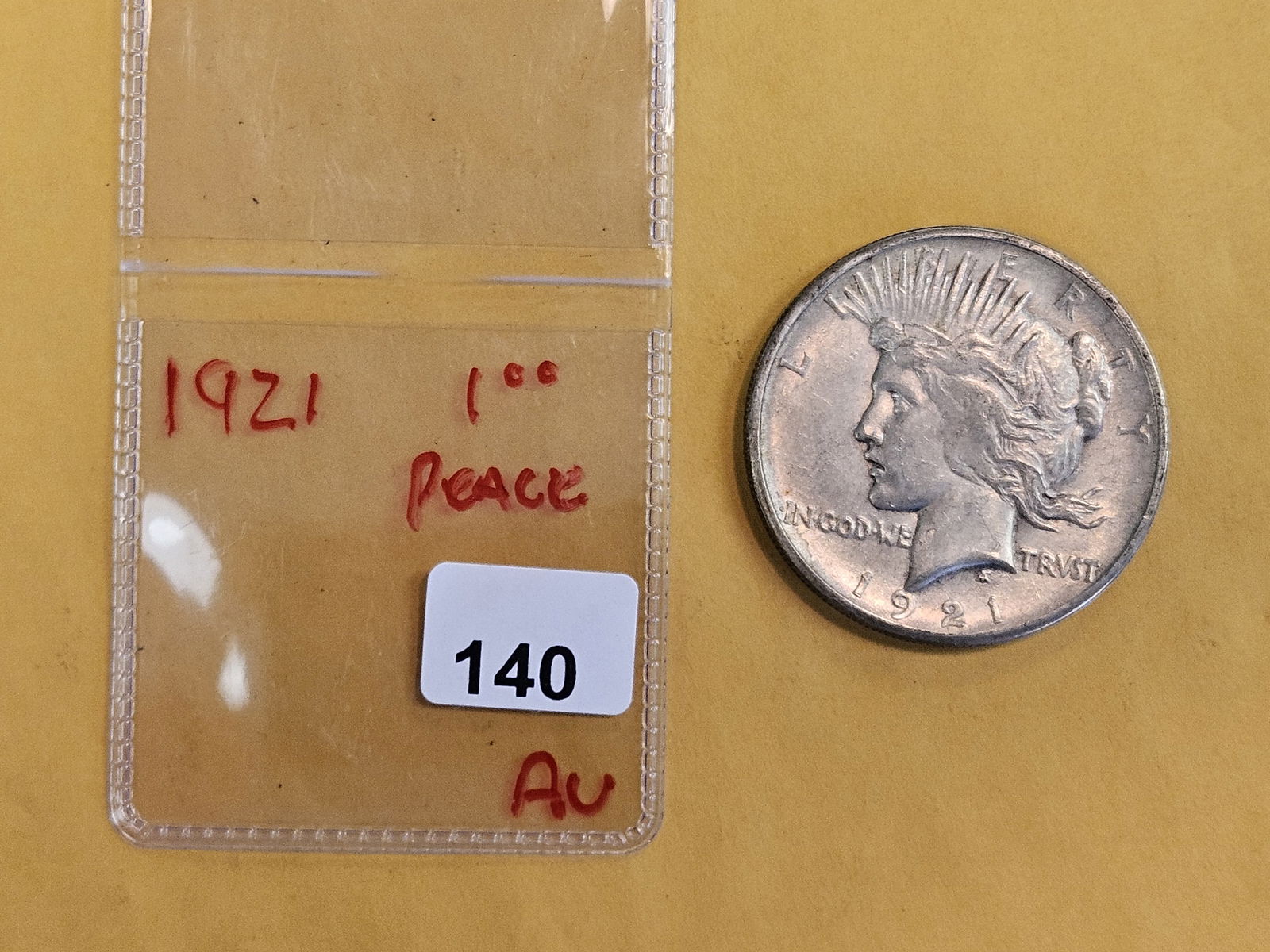 ** KEY DATE ** 1921 Peace silver Dollar in About Uncirculated - 2