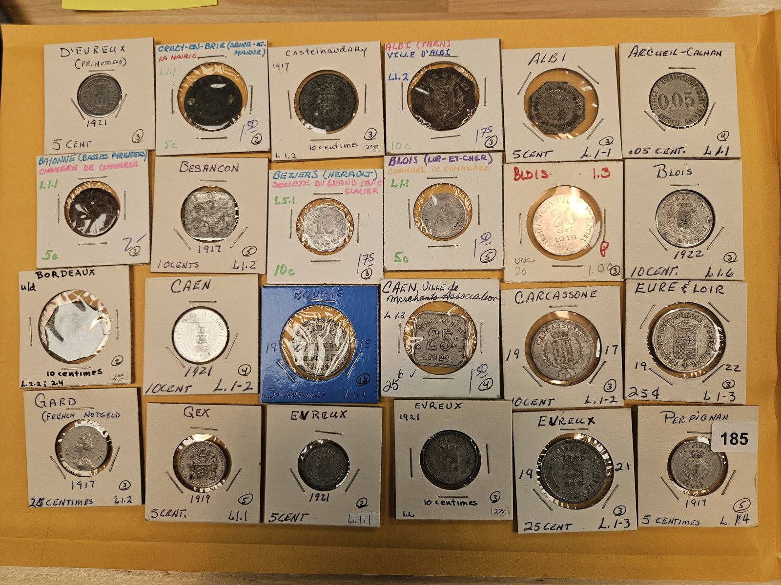 Twenty-four mixed World coins: All identified by date, denomination and KM number. All in 2x2's 