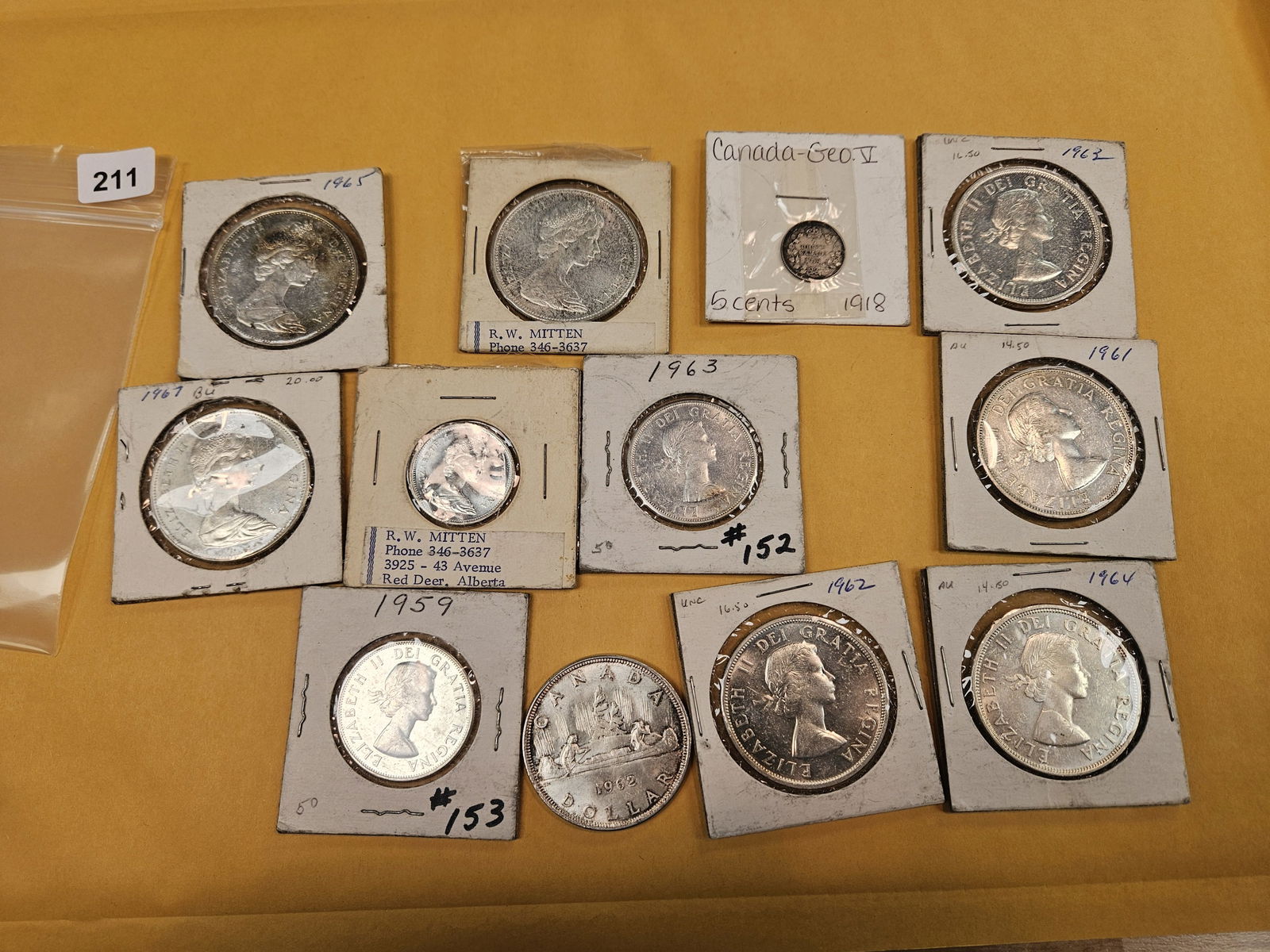 Twelve, mostly-larger, Canadian silver coins - 2