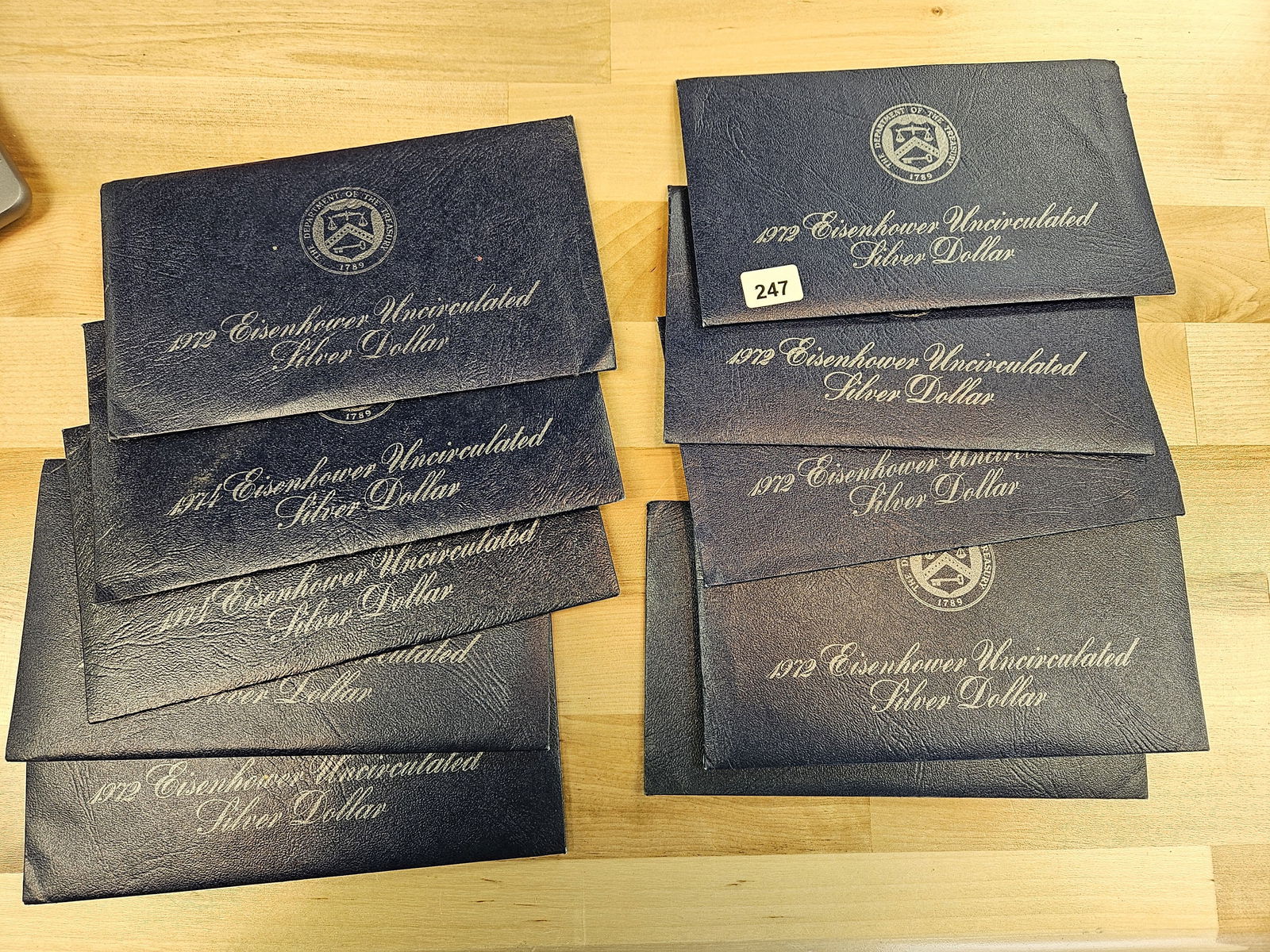 TEN mixed, SILVER, GEM Brilliant Uncirculated Eisenhower Dollars: SILVER Blue IKES! All in original GSA Flat packs. All in OGP