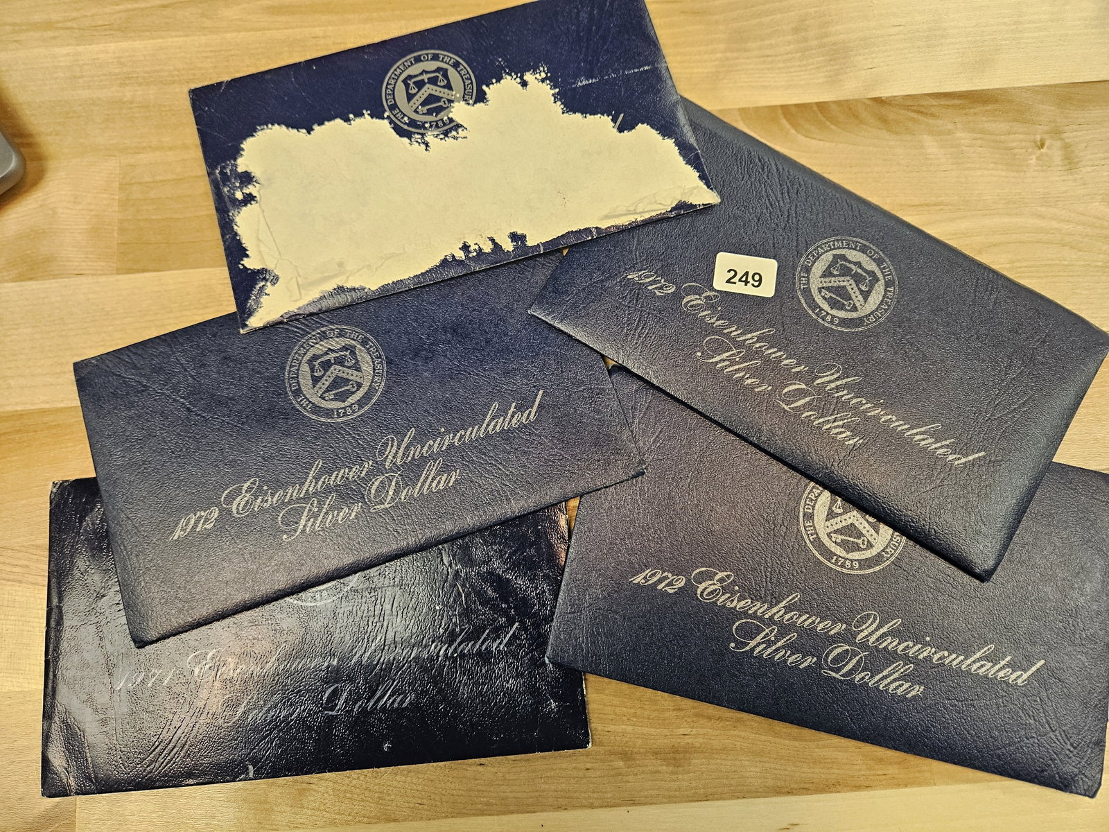 Five mixed, SILVER, GEM Brilliant Uncirculated Eisenhower Dollars: SILVER Blue IKES! All in original GSA Flat packs. All in OGP