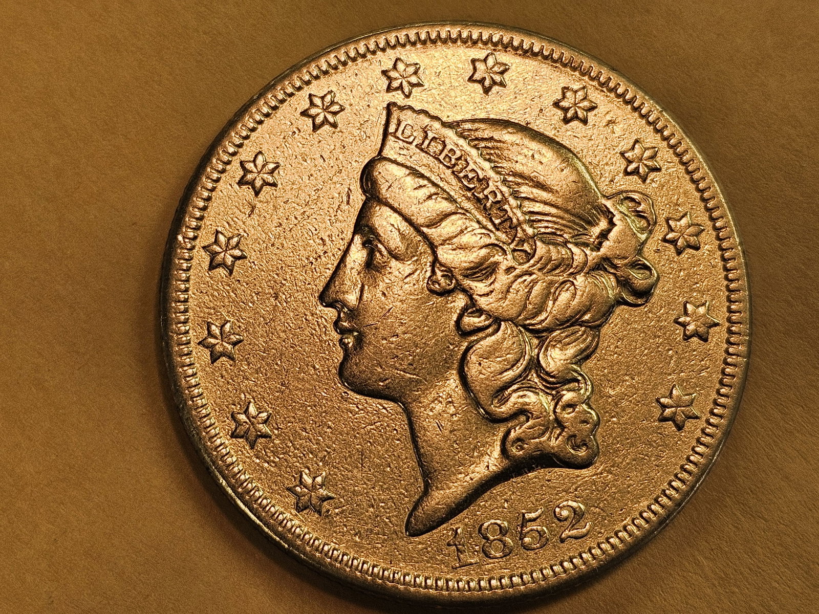 * GOLD * SEMI-KEY! 1852-O Gold Liberty Head Twenty Dollar Double Eagle: Tougher New Orleans minted gold! Check your price guides. Has a light seawater look to it, like it may have been from a shipwreck 
