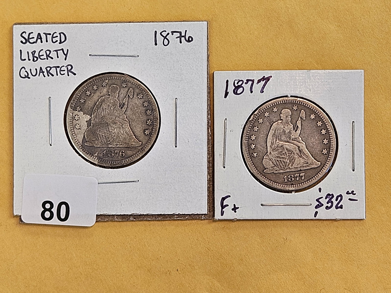 1876 and 1877 Seated Liberty silver Quarters: In Very Good to Fine 