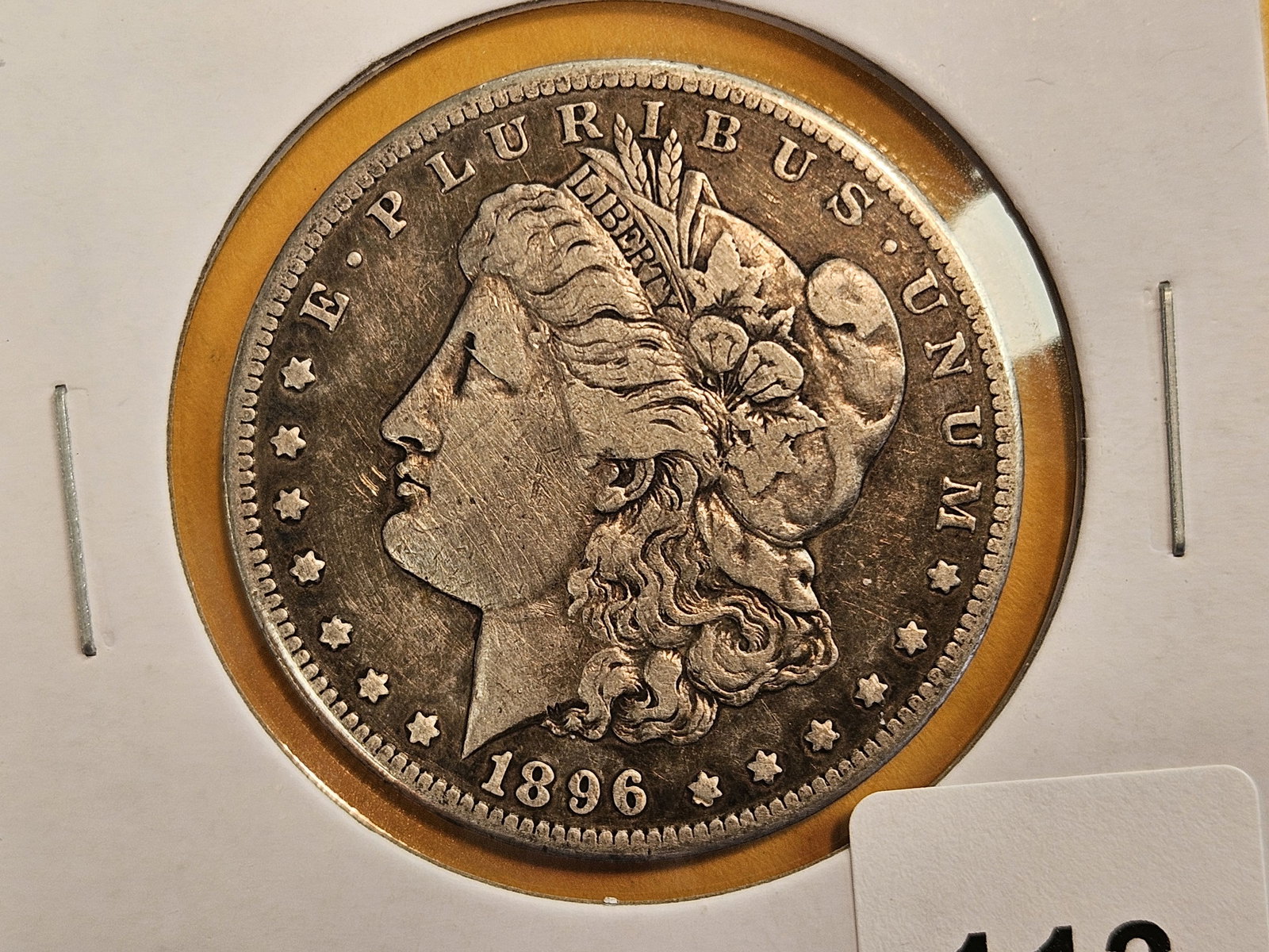 Better date 1896-S Morgan silver Dollar: In Very Fine 