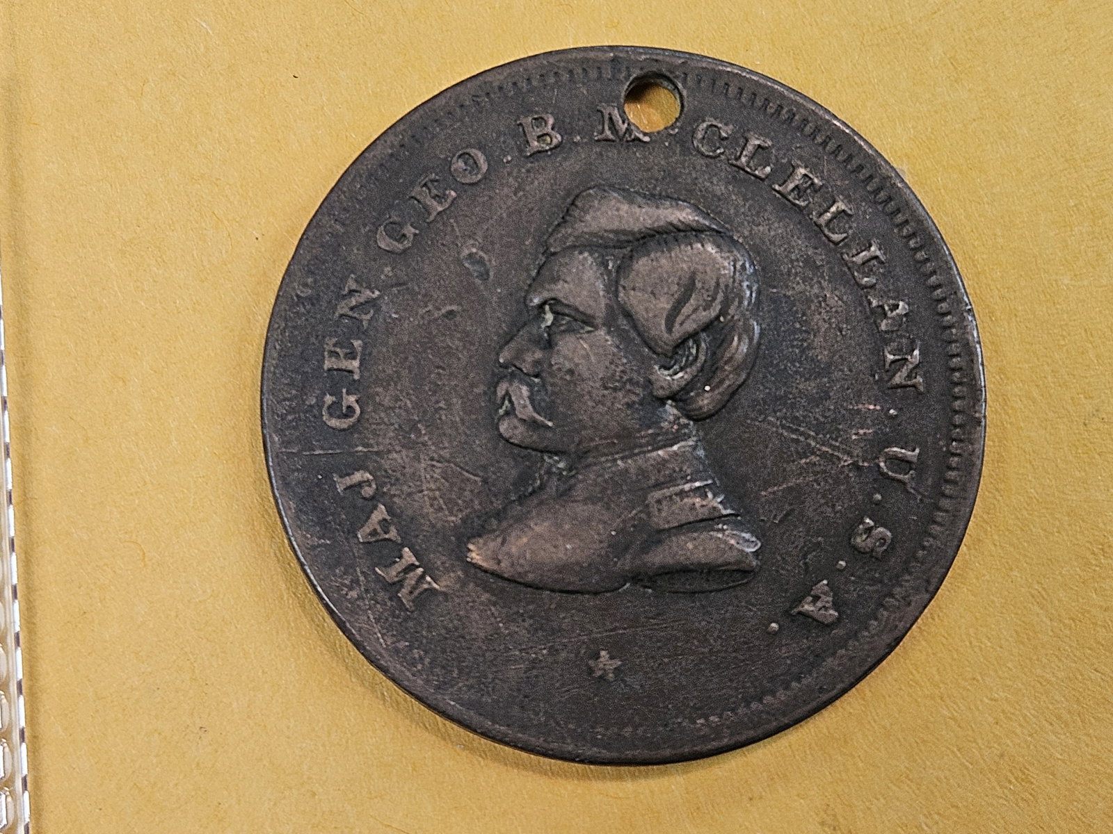 Cool 1864 George B McClellan Copper Dog Tag!: 1864 George B. McClellan "First in Hearts of His Soldiers" Copper Dog Tag. This medalet/dog tag measures 30mm and is listed as Sullivan-Dewitt GMcC 1864-12. Often times these dog tags were issued to U