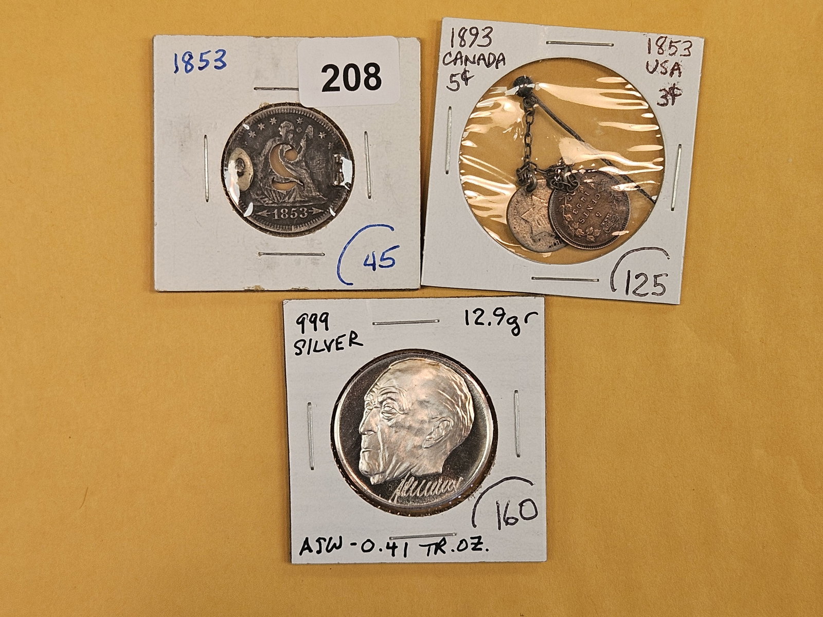 Couple of mixed pieces of silver exonumia (1 of 9)