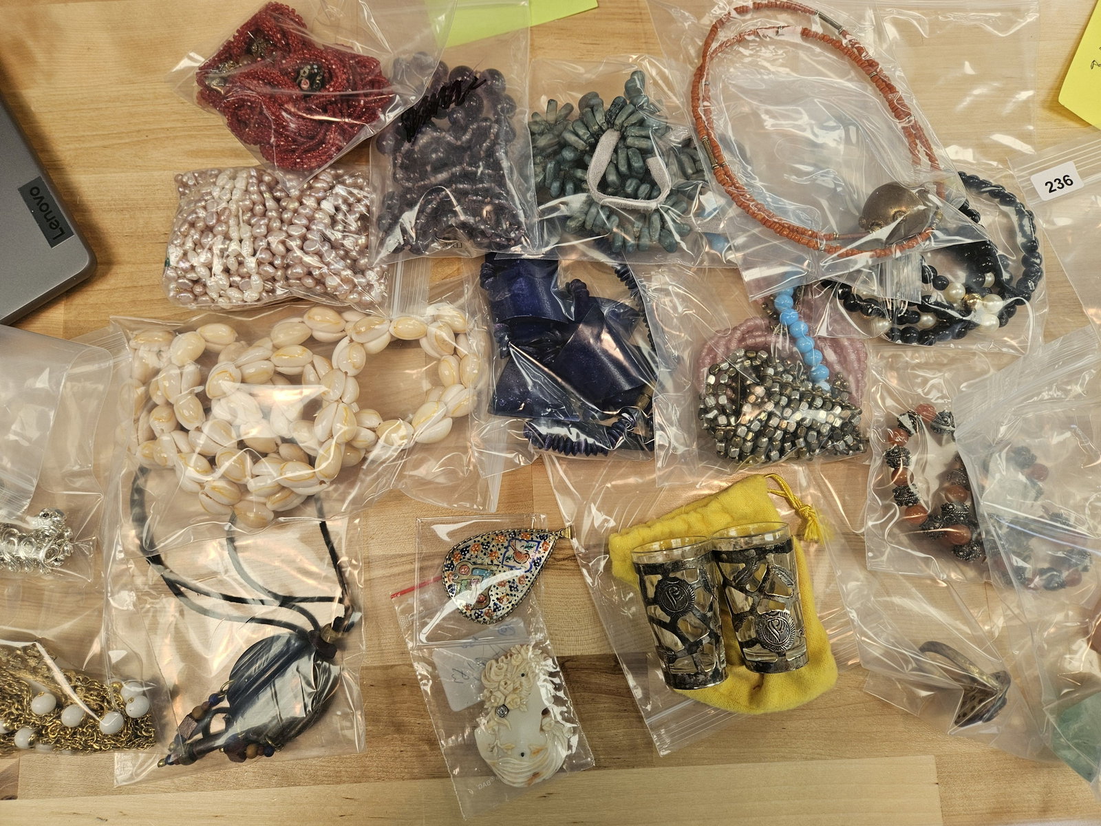 JEWELRY: From dealer. He sorted out all his nicer costume jewelry. He said a lot was vintage, but it's not really my cup of bananas 