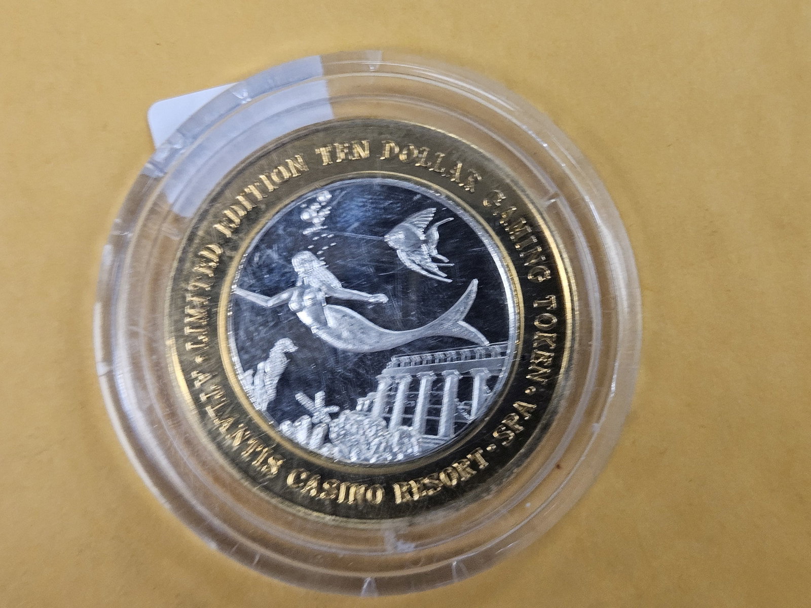 One Ten Dollar .999 fine Silver Center casino token - 2