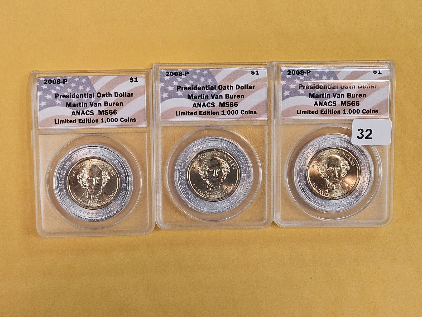 Three ANACS-graded Encased Presidential Dollars in Mint State 66 (1 of 2)