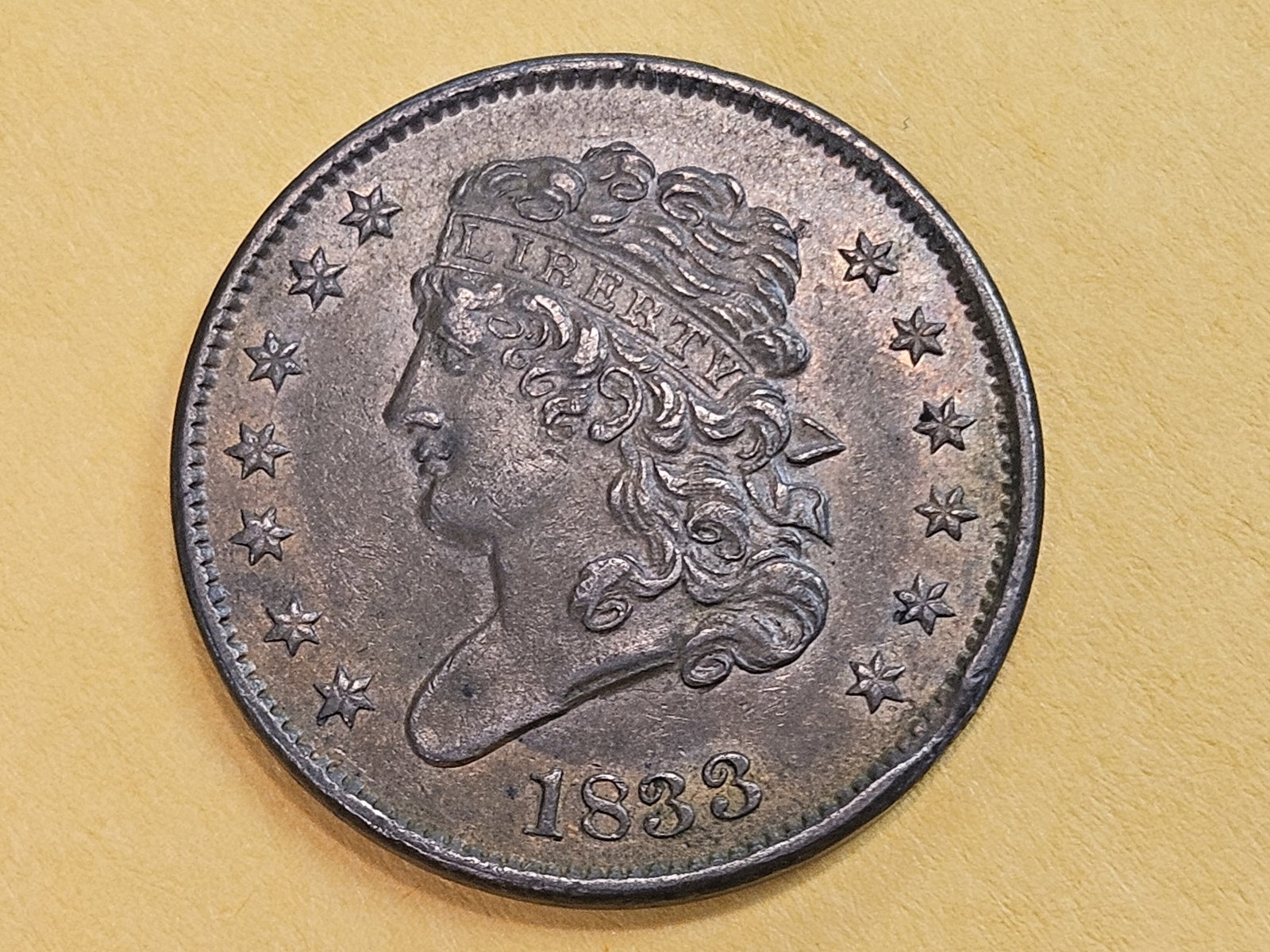 Beautiful 1833 Classic Head Half Cent in Bright About Uncirculated: Has some original underlying luster! Somewhat reflective 