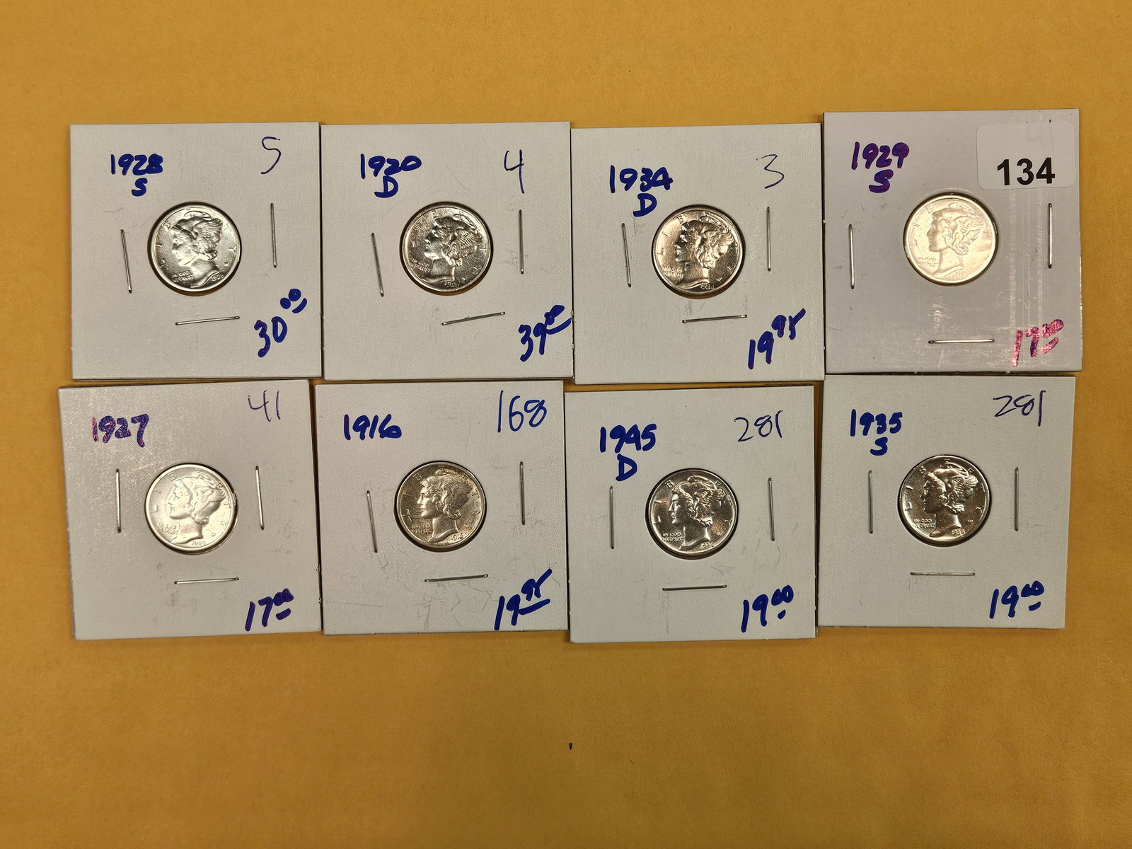 Eight mixed silver Mercury Dimes: All roughly in the about uncirculated range. Most lightly cleaned
