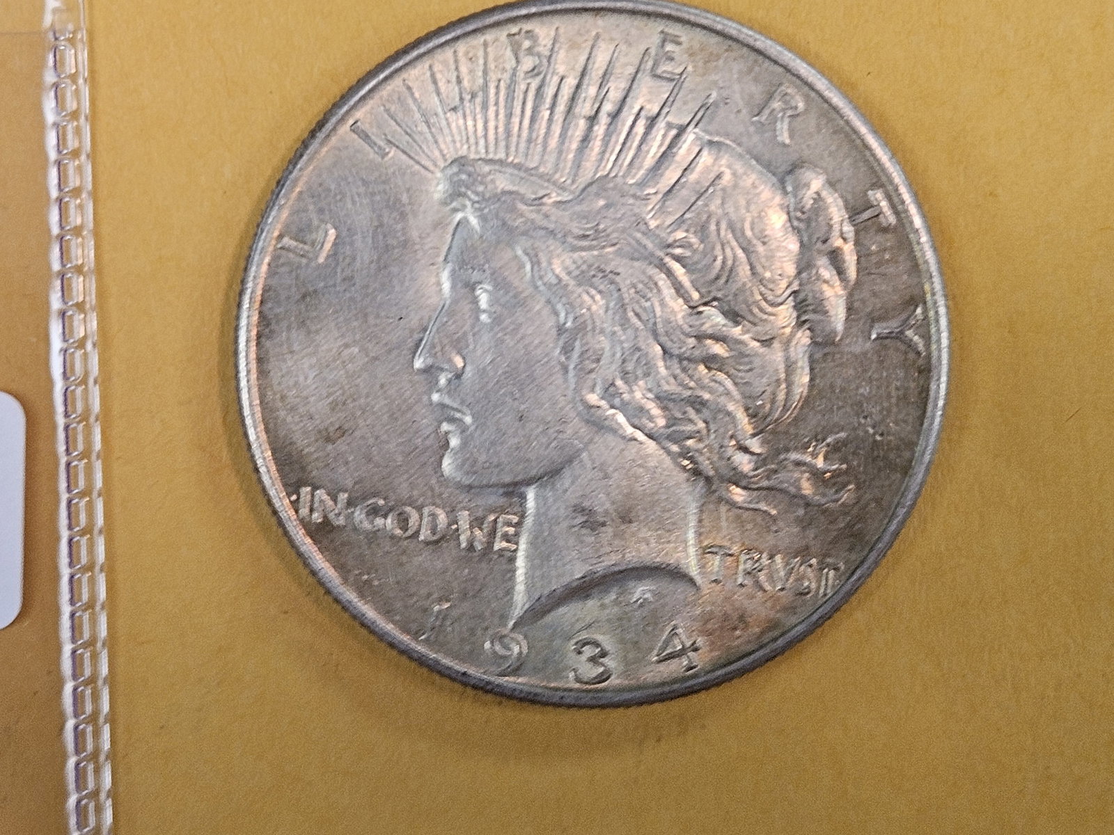 Better 1934 Peace silver Dollar in About Uncirculated - 58 (1 of 5)