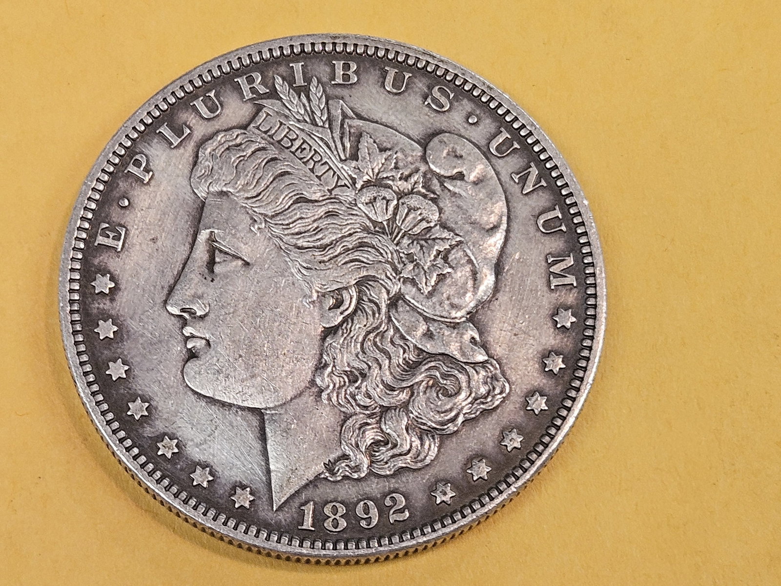 Better Grade 1892 Morgan silver Dollar in About Uncirculated - 58 - 3