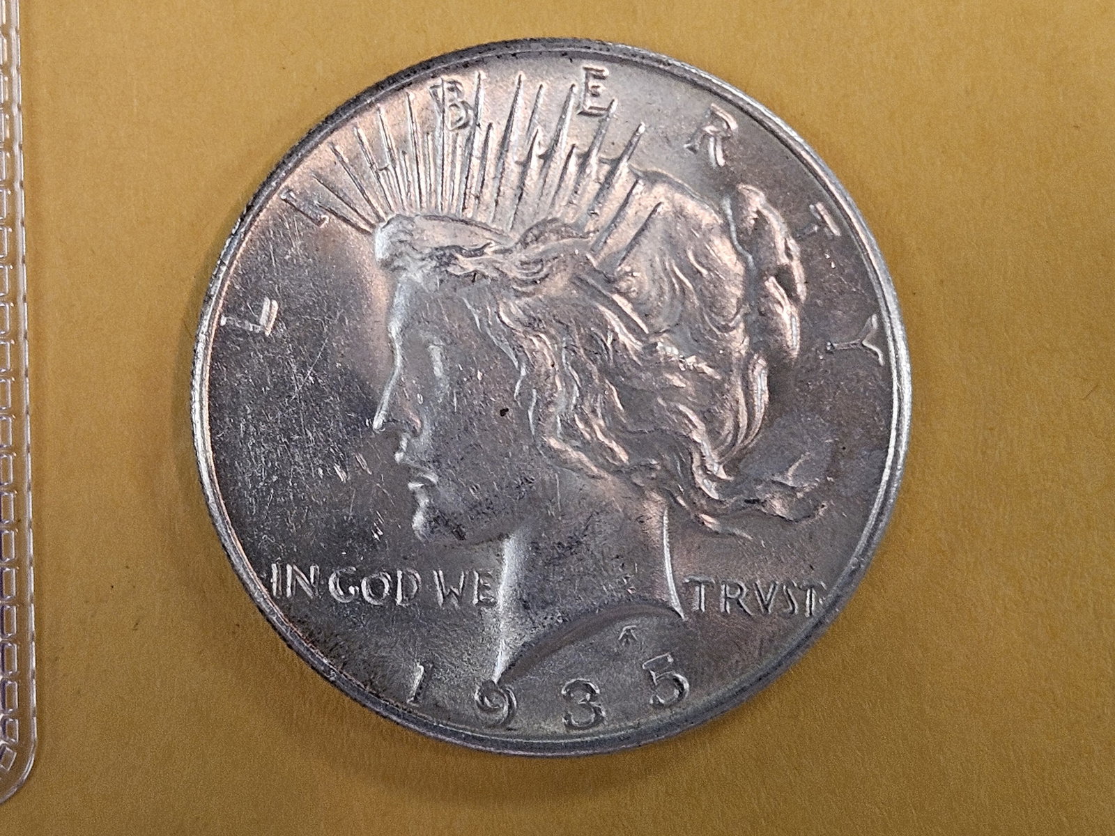 Choice Brilliant Uncirculated 1935 Peace silver Dollar: Nice luster 