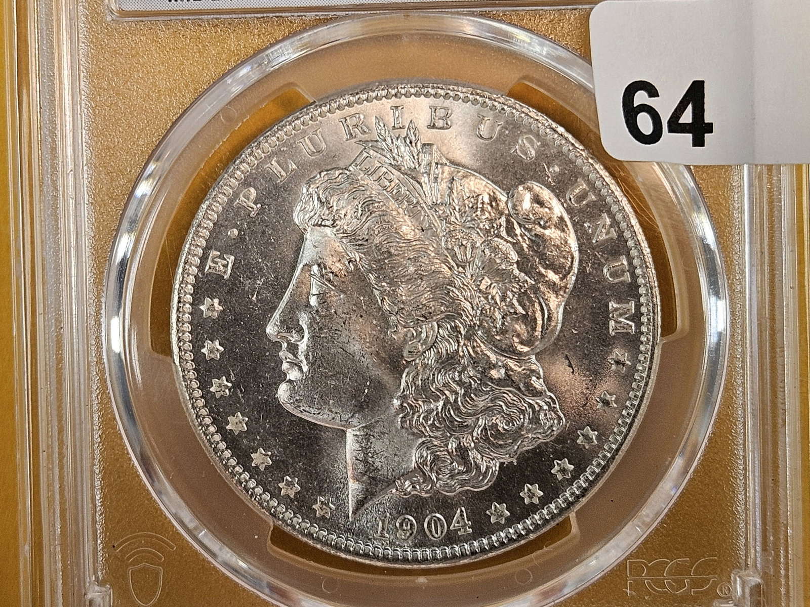 PCGS 1904-O Morgan Dollar in Mint State 64: Looks GEM! 