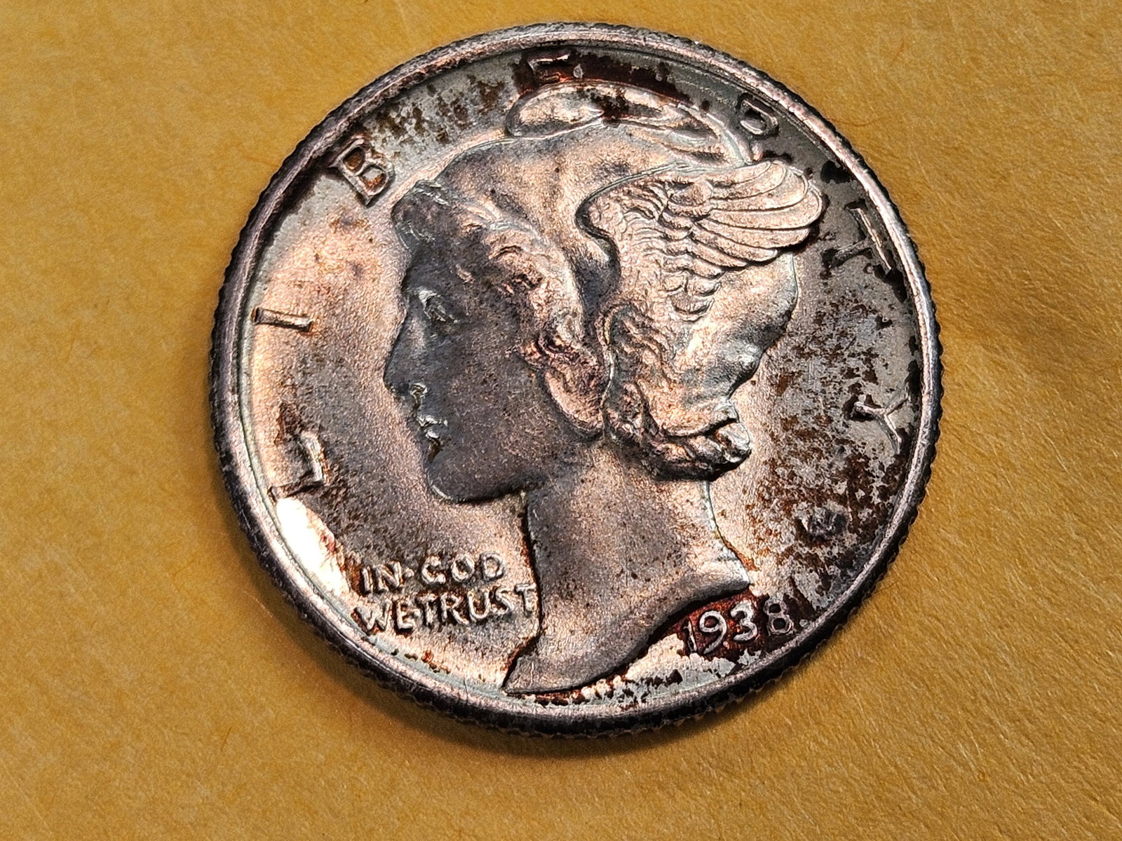 Choice Brilliant Uncirculated 1938 Mercury Silver Dime FSB: Full Split Bands. Original toning 