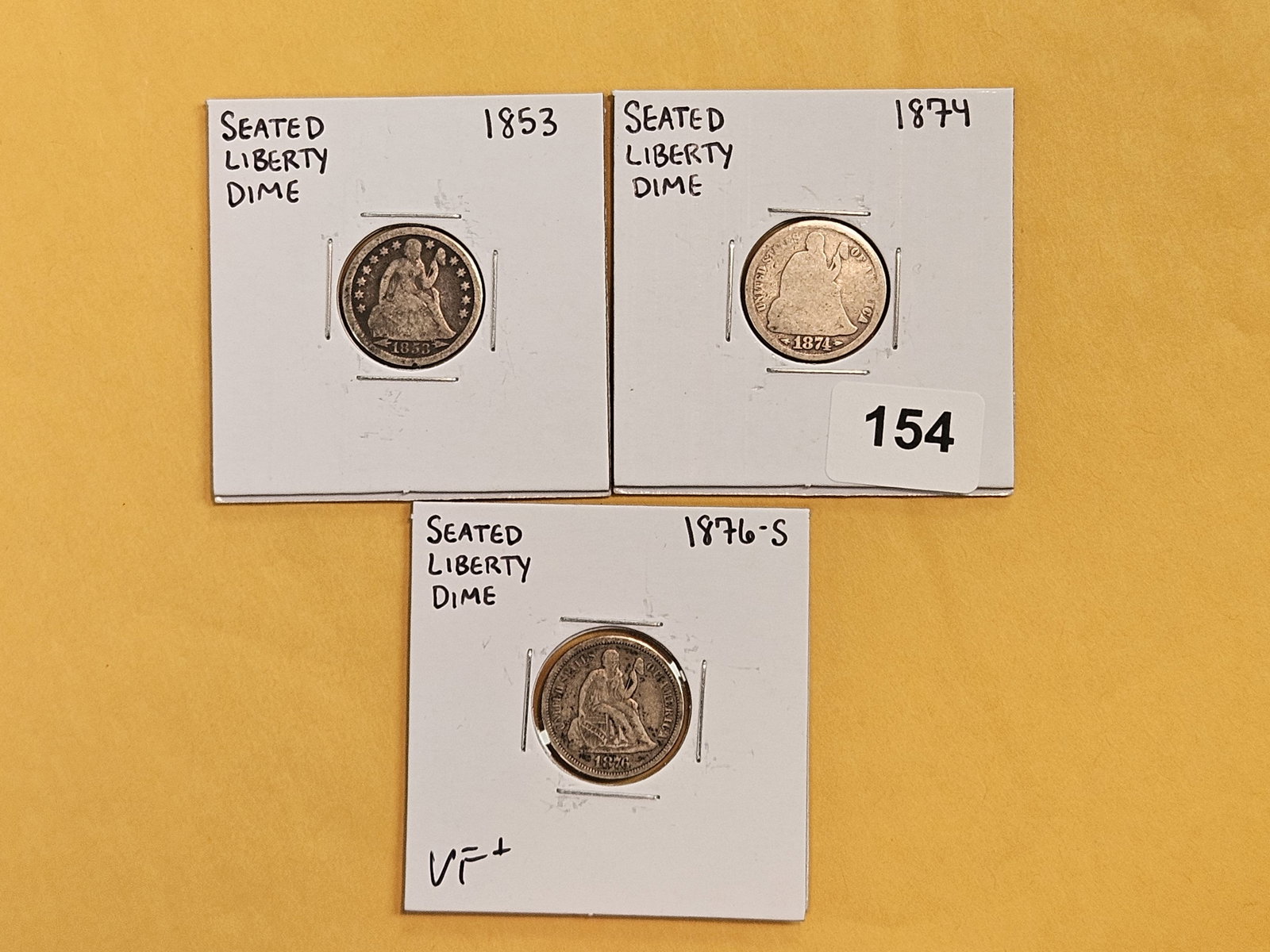 Three mixed Seated Liberty silver Dimes: 1853, 1874 and 1876-S