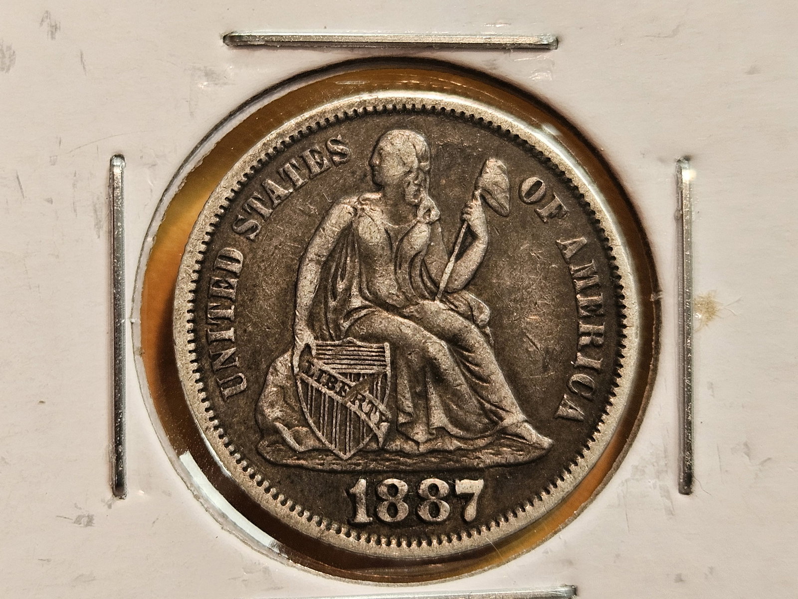 1887-S Seated Liberty silver Dime in Extra Fine - plus: Darker patina 