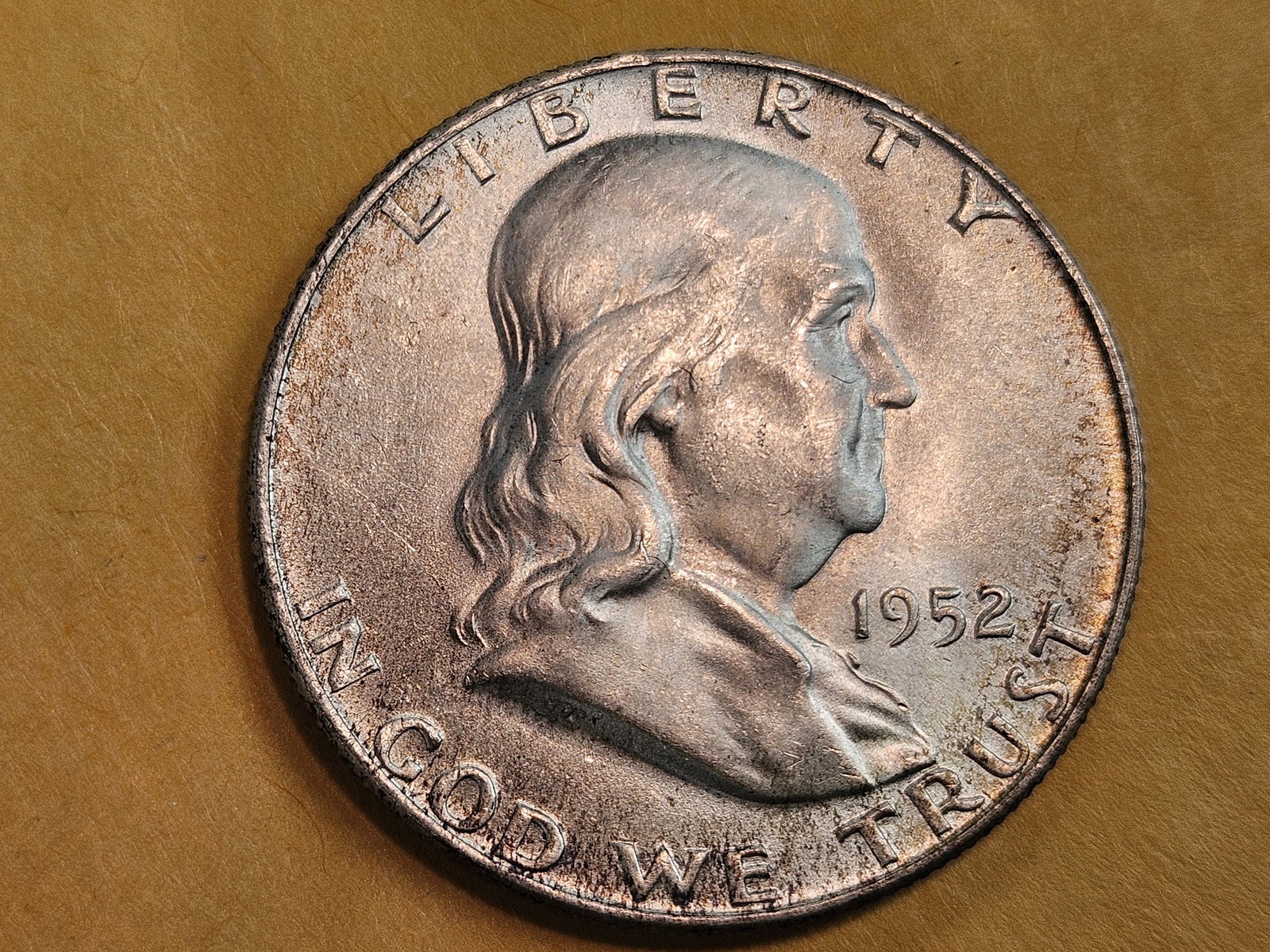 Very Choice Brilliant Uncirculated 1952-D Franklin silver Half Dollar: Good toning. Looks like full bell lines to me 