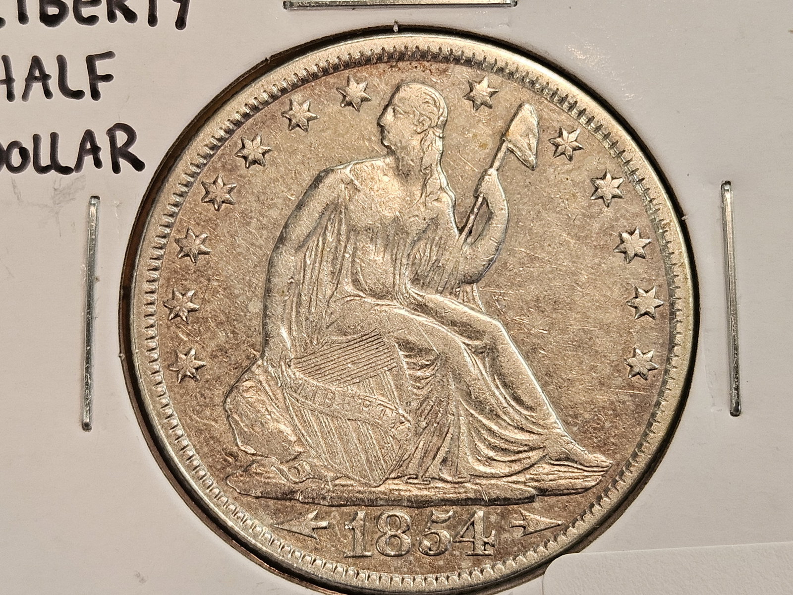 1854-O With Arrows Seated Liberty Half Dollar: In Very Fine plus