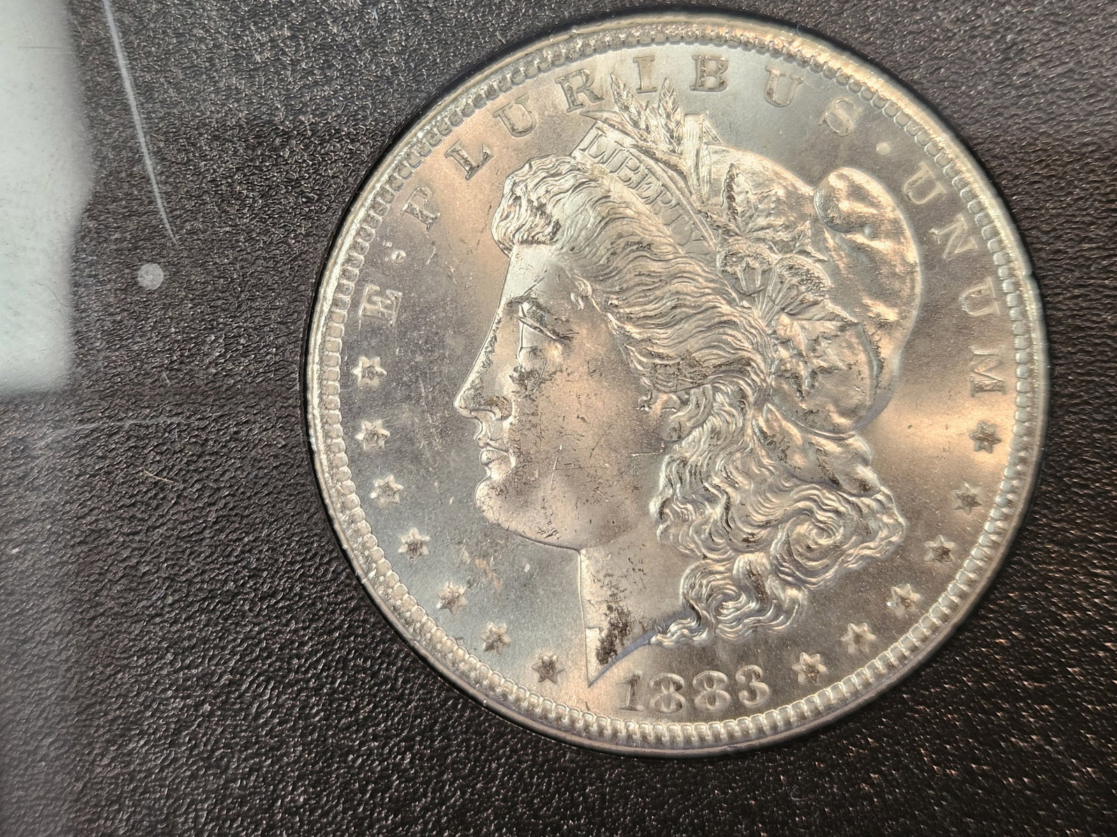 ** KEY DATE ** GSA 1883-CC Morgan Dollar in Choice Brilliant Uncirculated: KEY DATE! CARSON CITY! In original GSA hard case. No outer box or COA. Sharp and frosty!
