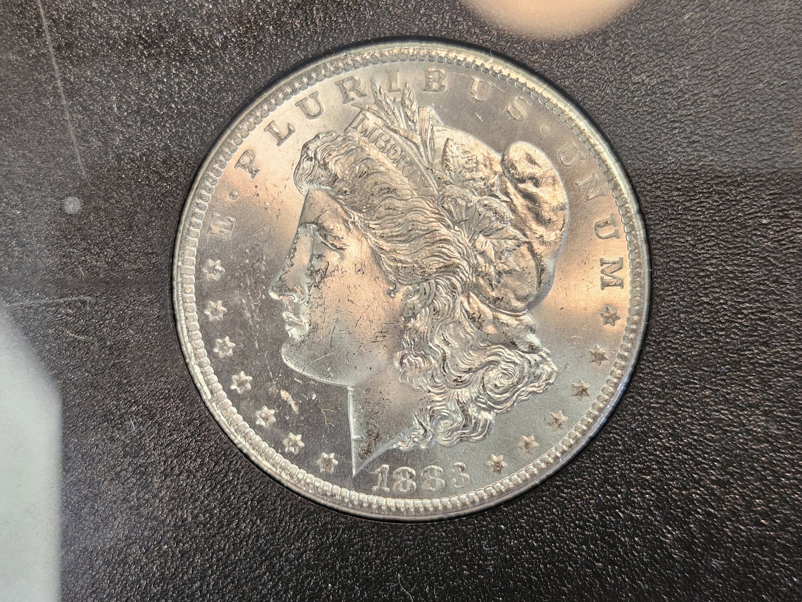 ** KEY DATE ** GSA 1883-CC Morgan Dollar in Choice Brilliant Uncirculated - 4