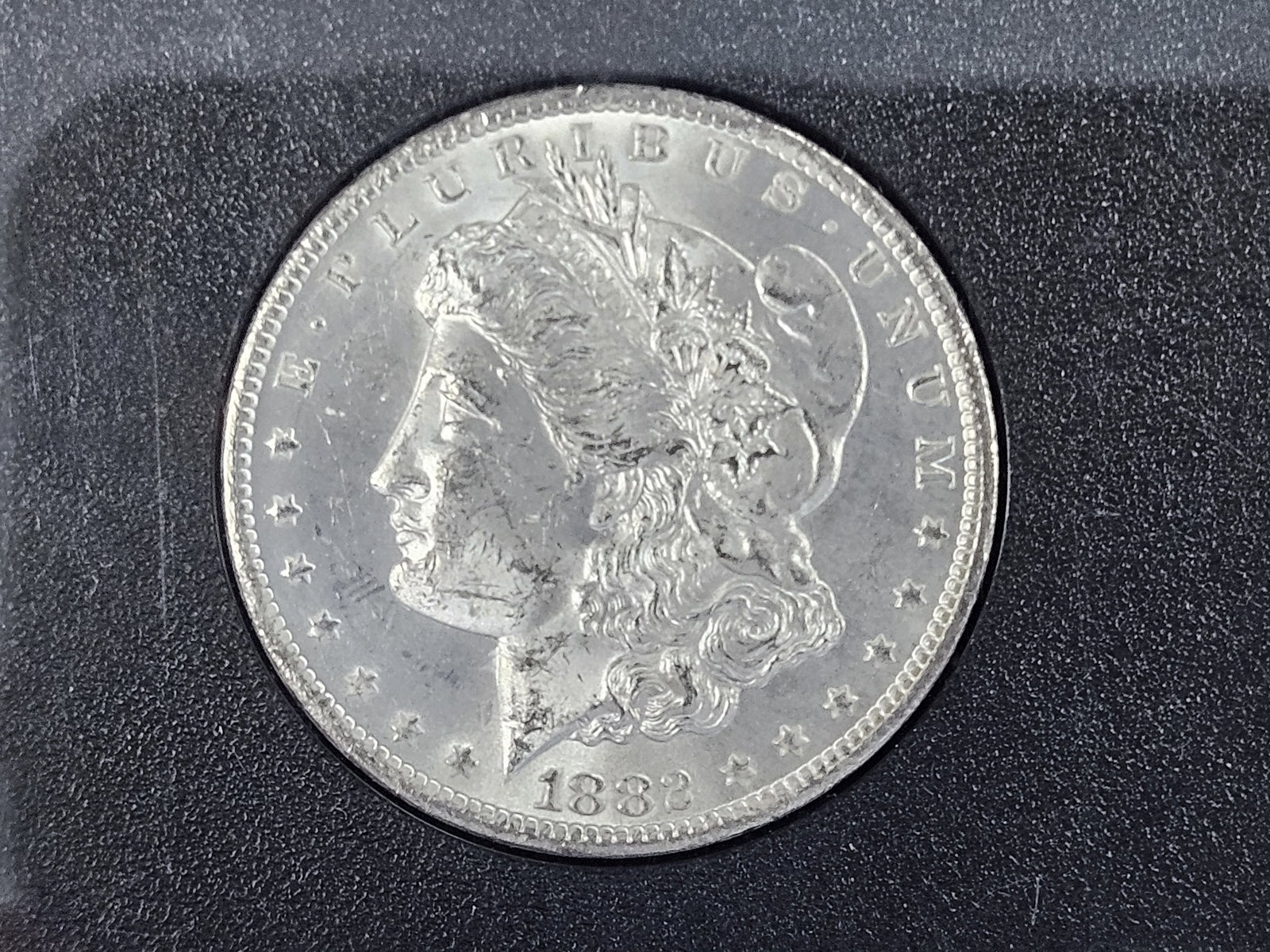 ** KEY DATE ** GSA 1882-CC Morgan Dollar in Choice Brilliant Uncirculated: KEY DATE! CARSON CITY! In original GSA hard case. No outer box or COA. Sharp and well struck!
