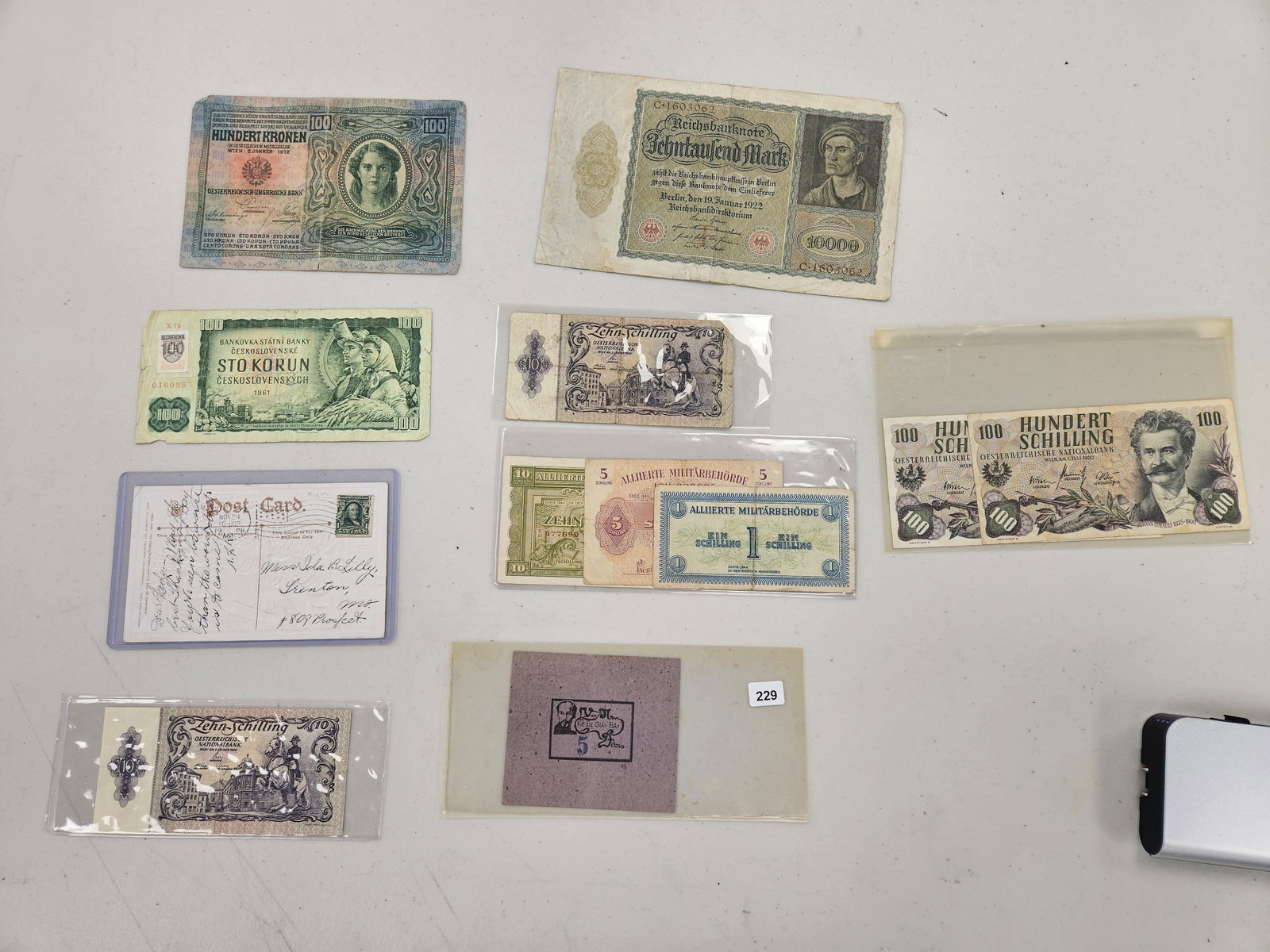 Twelve little nicer, mixed, World notes: None crisp. Couple better. One postcard with old stamp 