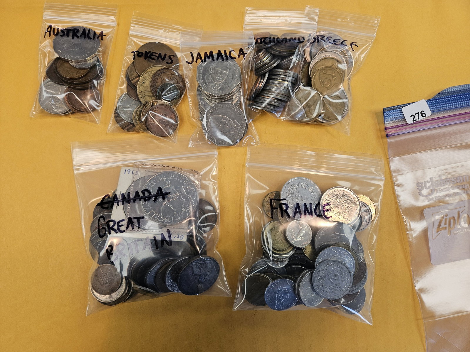 Seven bags of World coins (1 of 2)