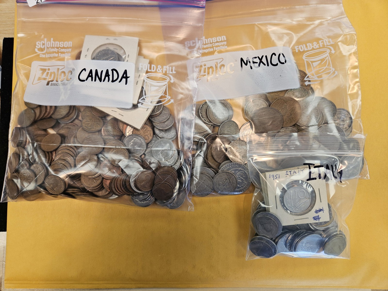 Three bags of World coins (1 of 2)