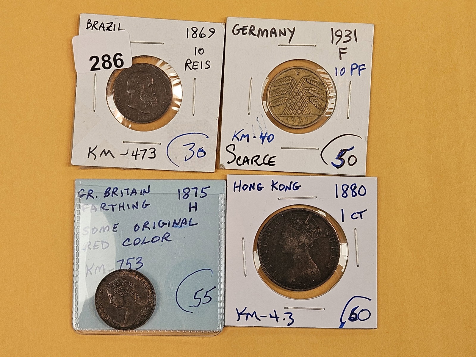 Four better date and-or grade world coins (1 of 9)