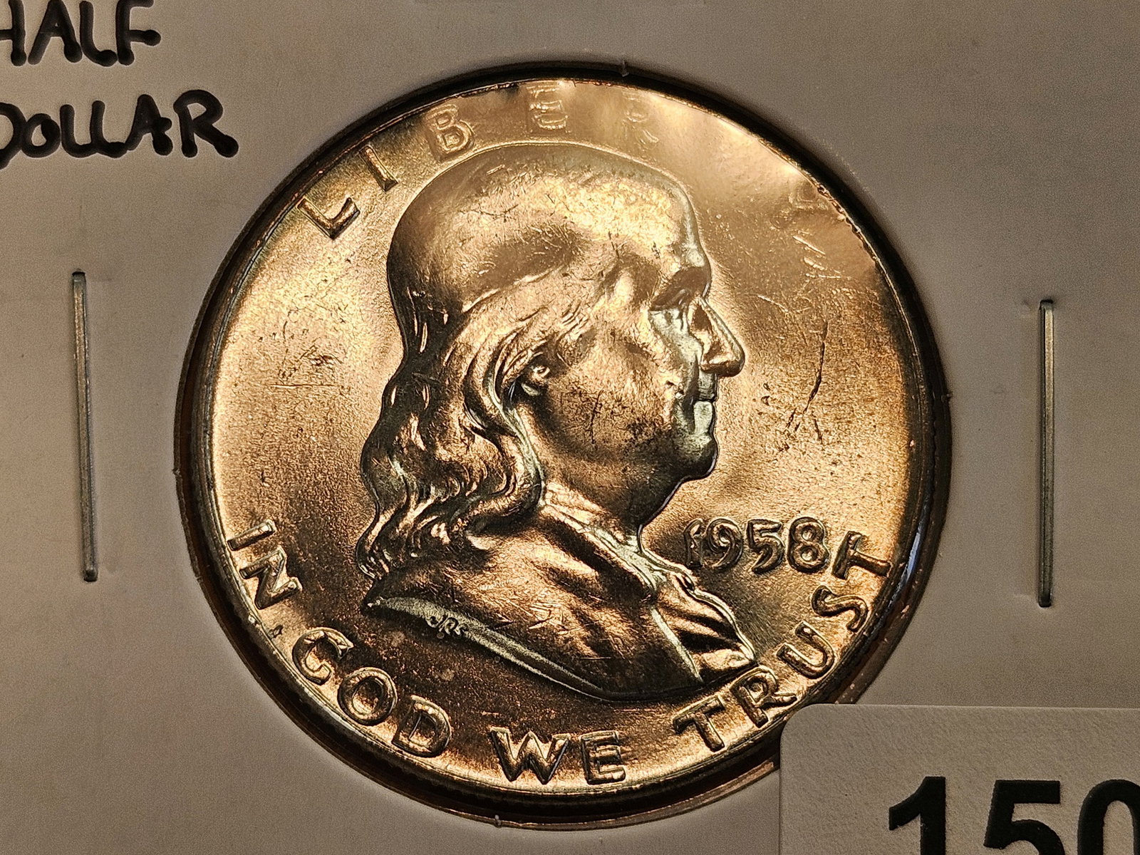 Very Choice Brilliant Uncirculated 1958 Franklin silver Half Dollar: Nice toning 