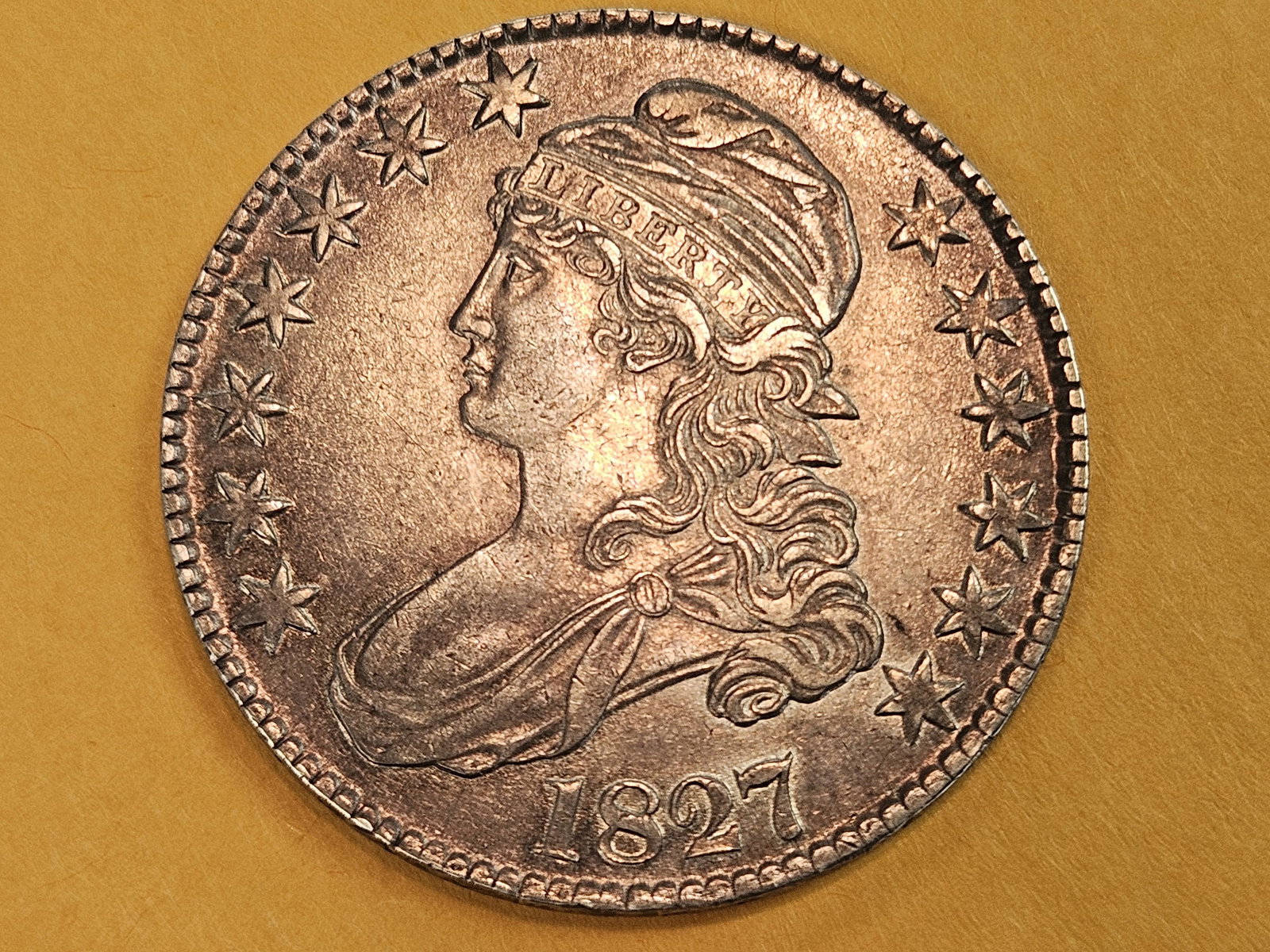 Bright About Uncirculated plus 1827 Capped Bust Half Dollar: Excellent looking coin! Lovely original patina. OLO6. R-2 