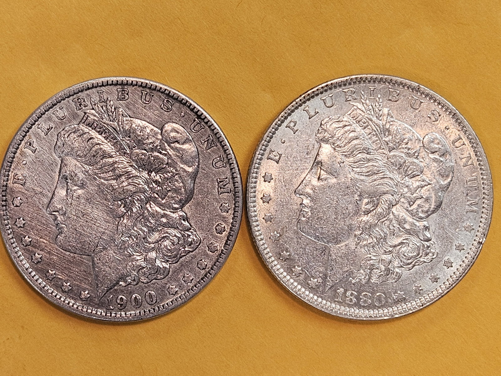 Two Brilliant About Uncirculated plus Morgan Silver Dollars (1 of 3)