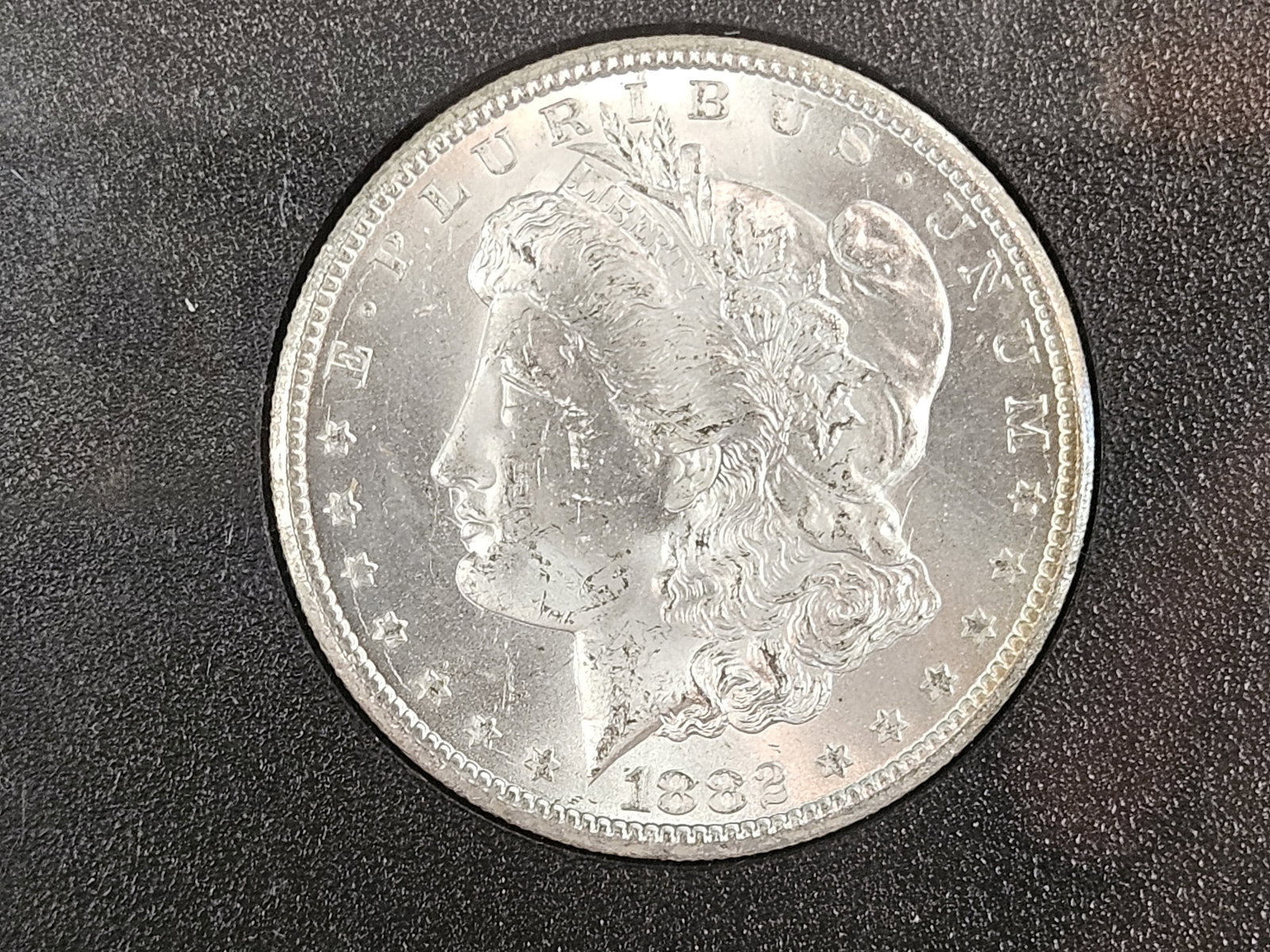 ** KEY DATE ** GSA 1882-CC Morgan Dollar in Choice Brilliant Uncirculated plus: KEY DATE! CARSON CITY! In original GSA Hard pack. No outer box or COA. Frosty and well-struck 